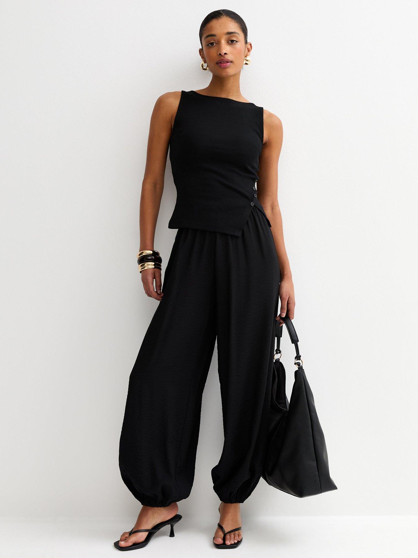 Image 3 of 5 of New Look Black Asymmetric Hem Button Side Vest Top