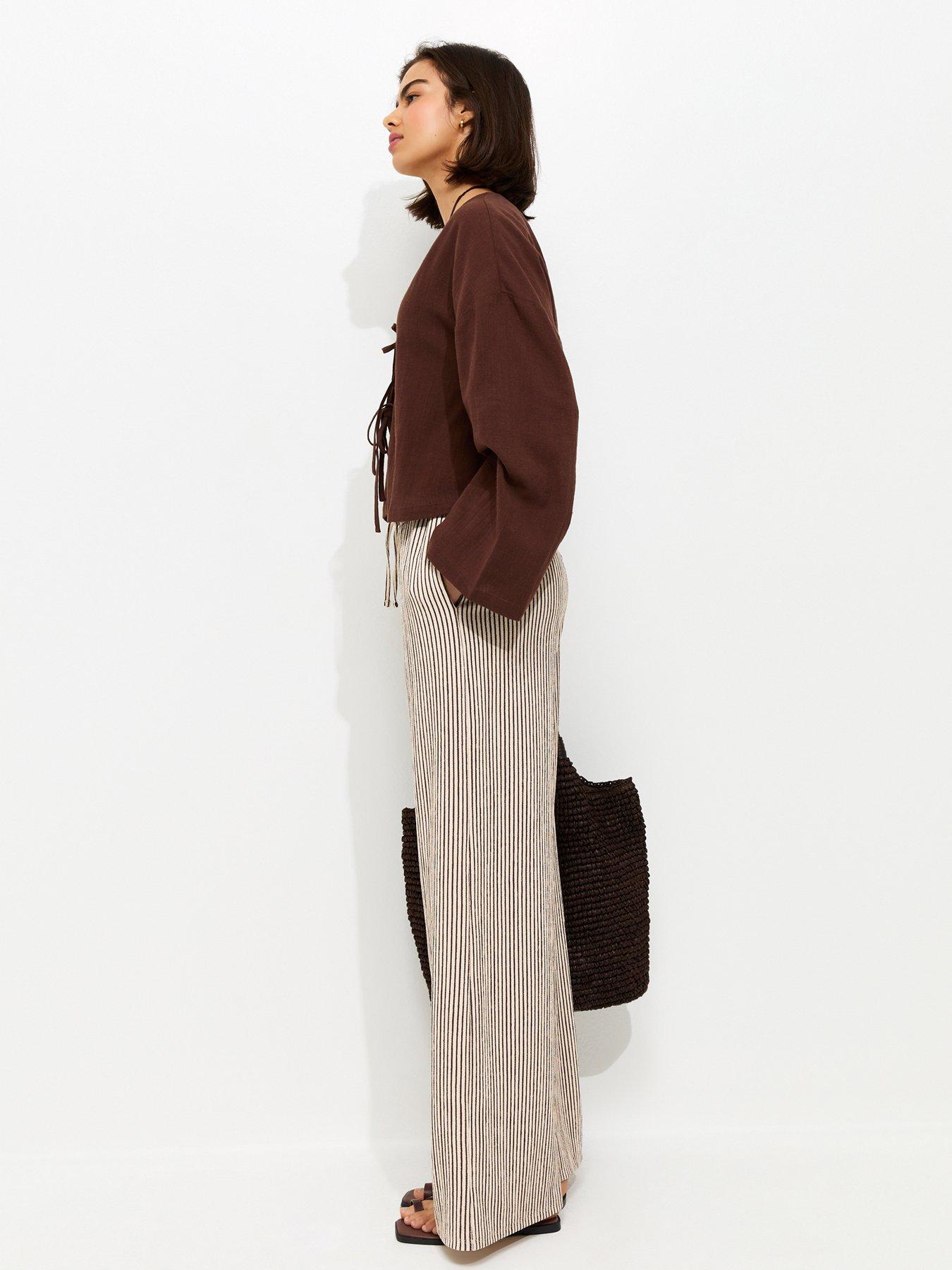 new-look-thin-stripe-crinkle-texture-wide-leg-trousers-brownback