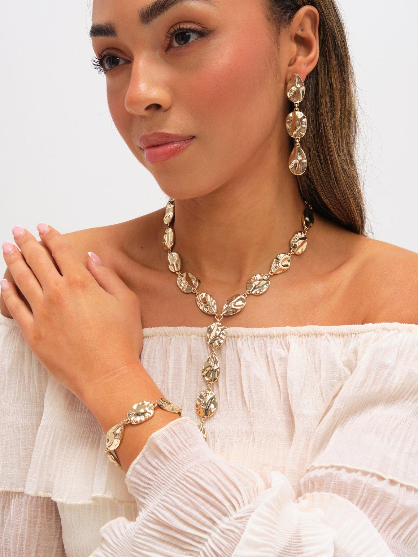mood-mood-gold-polished-molten-drop-earringsback