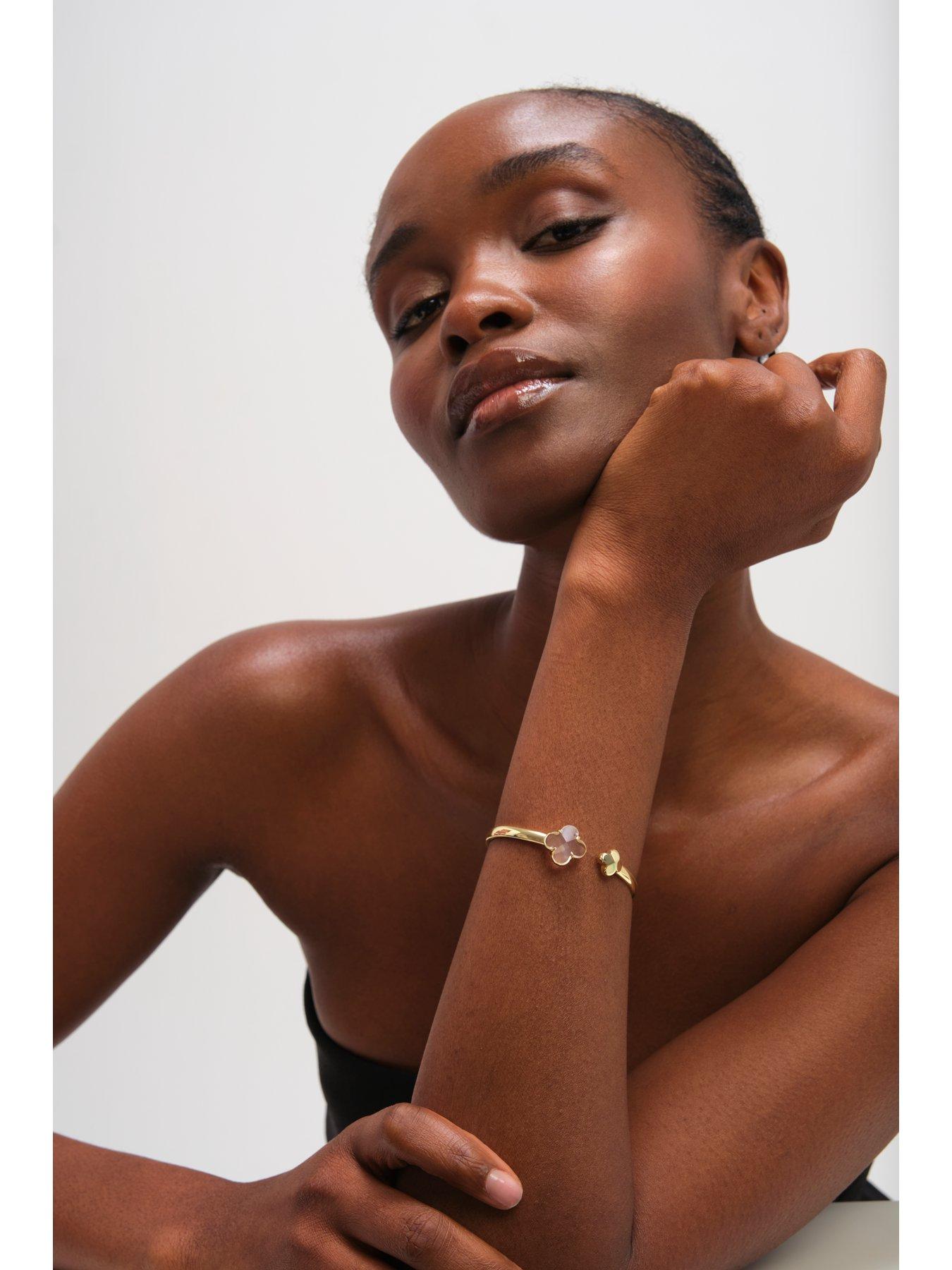 jon-richard-gold-polished-and-crystal-clover-bangleback