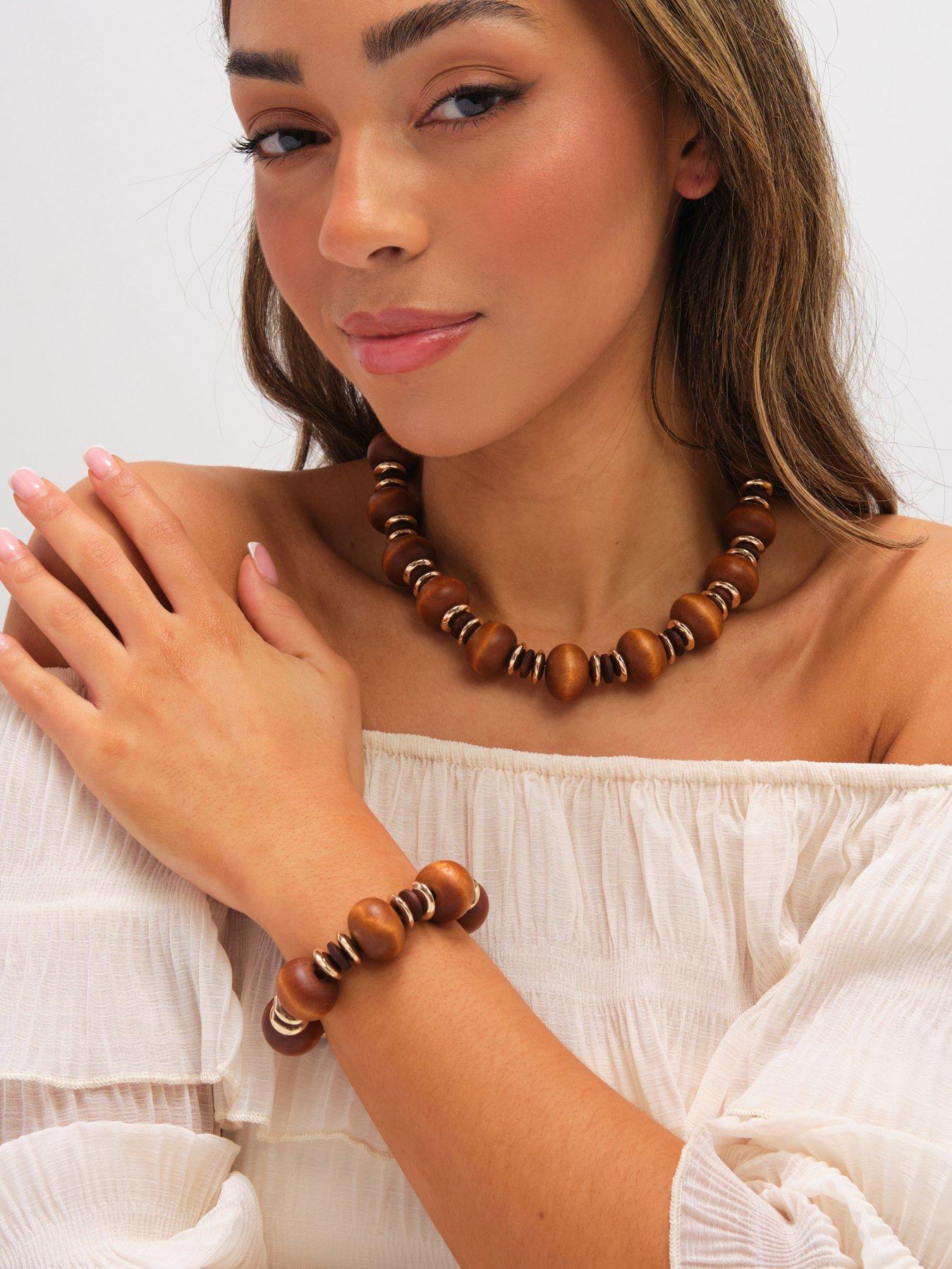 mood-gold-plated-and-wood-orb-stretch-braceletback