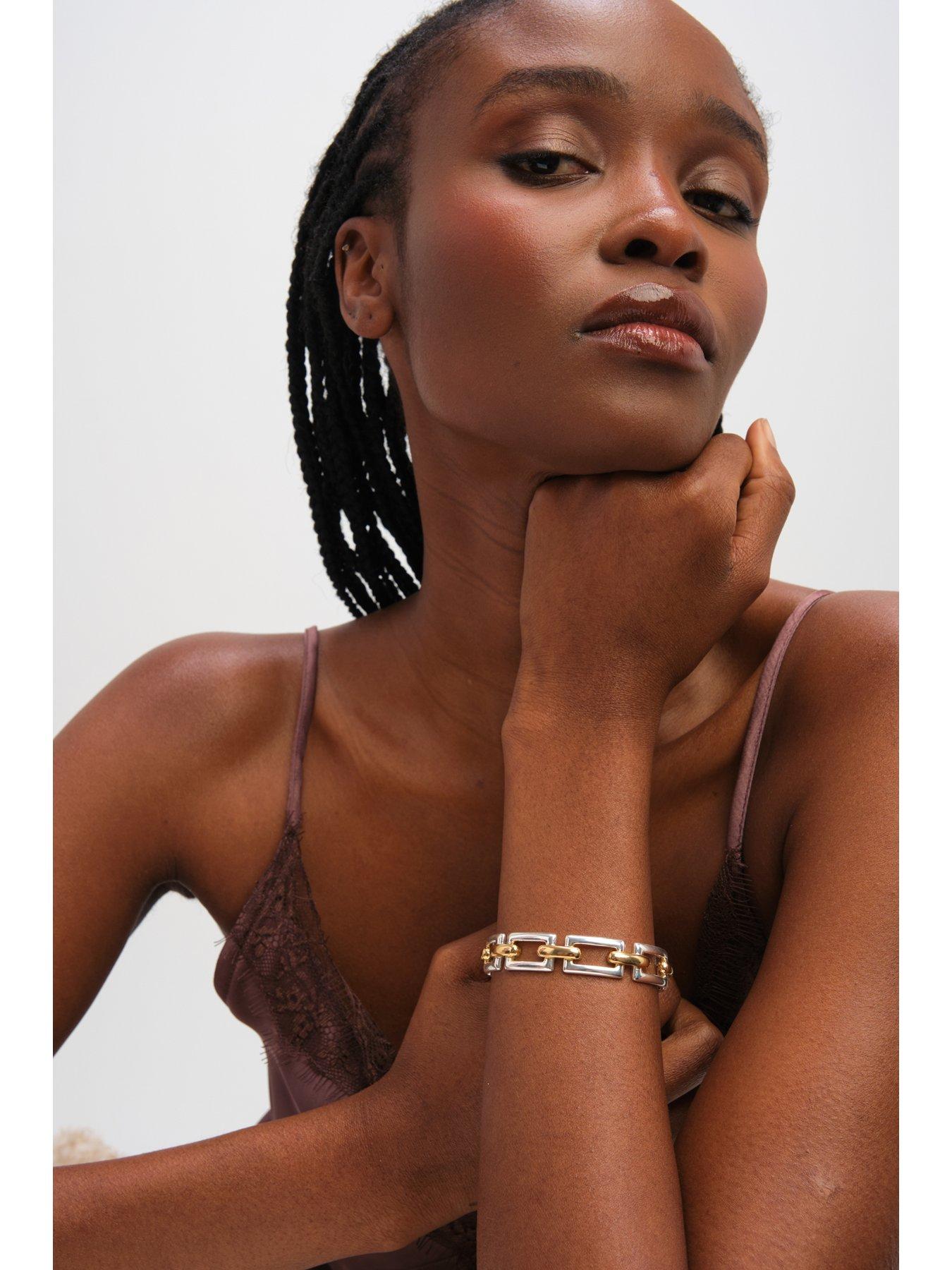 inicio-two-tone-polished-cuff-bracelet-gift-pouchstillFront