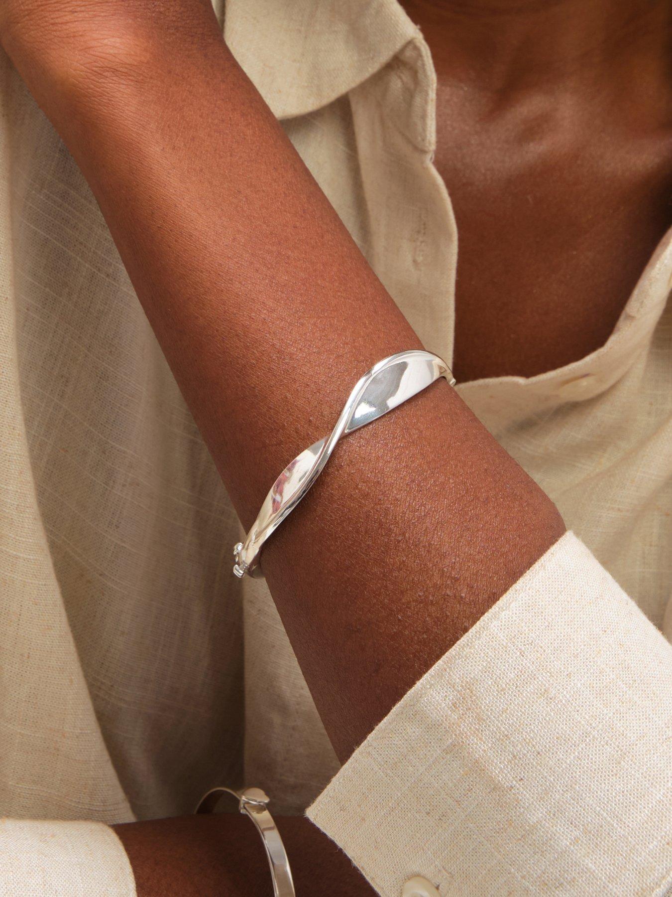 inicio-inicio-polished-wave-bangle-gift-pouchback