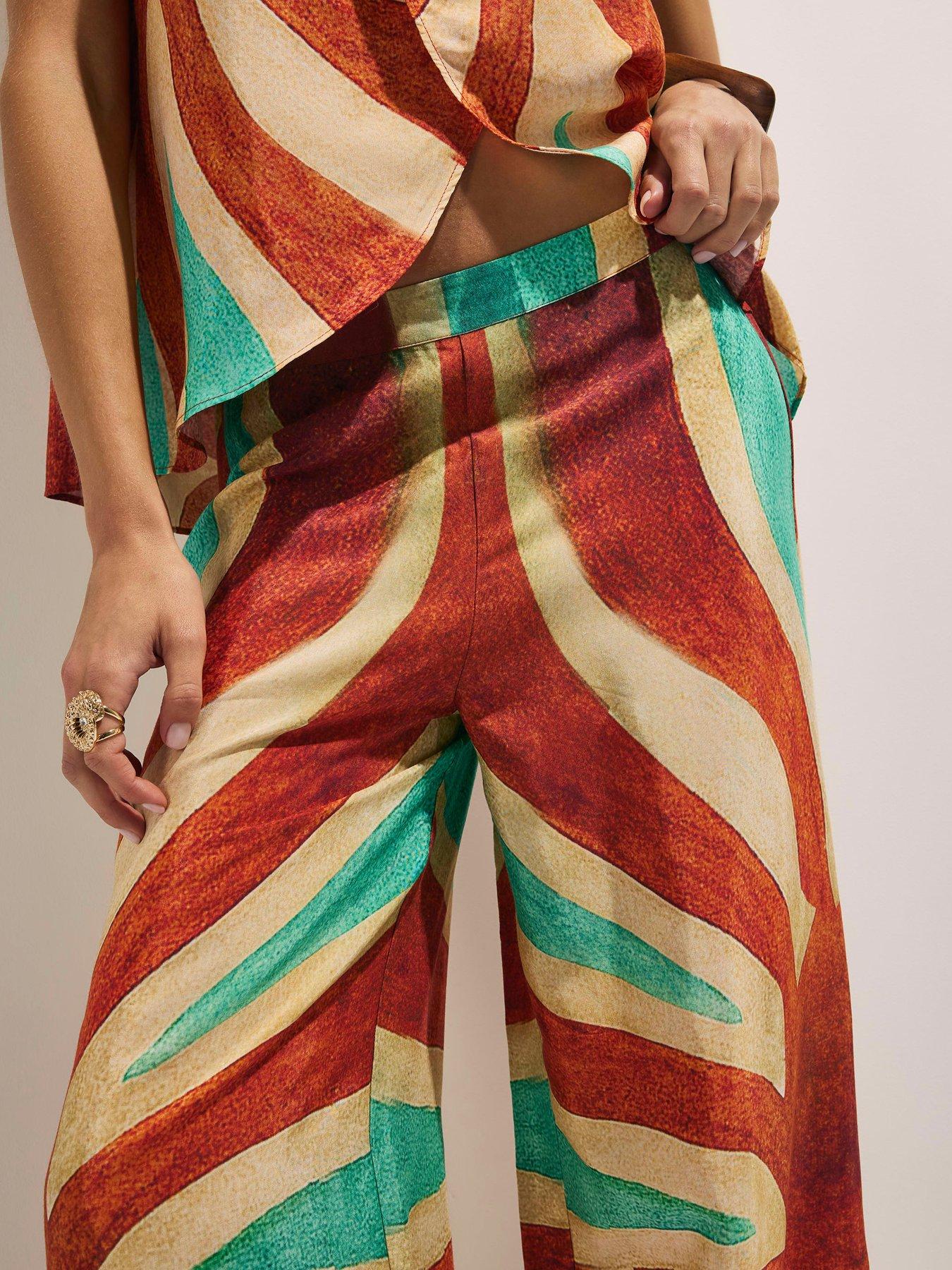 Image 4 of 4 of River Island Swirl Print Trousers - Brown