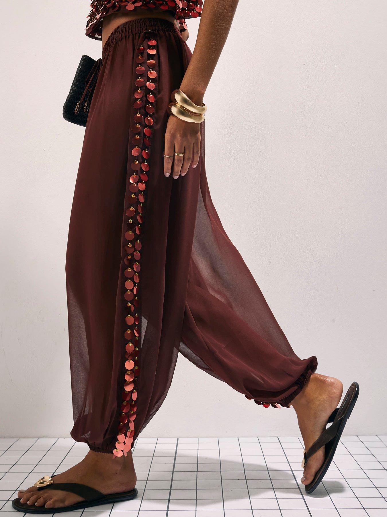 Image 4 of 6 of River Island Sequin Side Panel Balloon Trousers - Brown