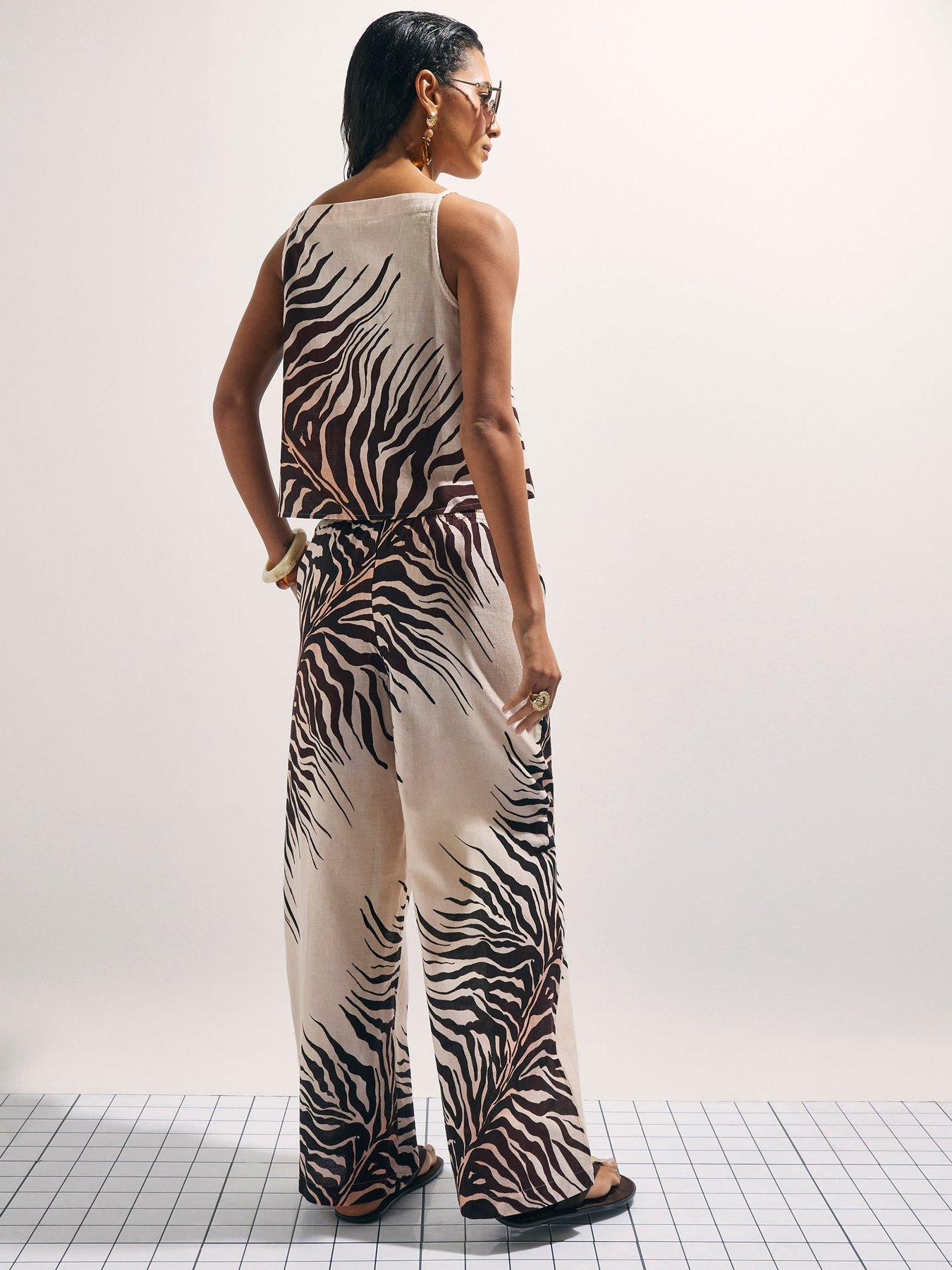 Image 2 of 4 of River Island Animal Printed Linen Trousers - Cream