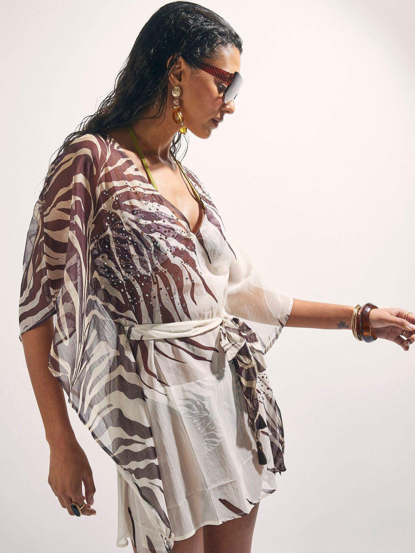 Image 4 of 6 of River Island Animal Mini Kaftan - Cream