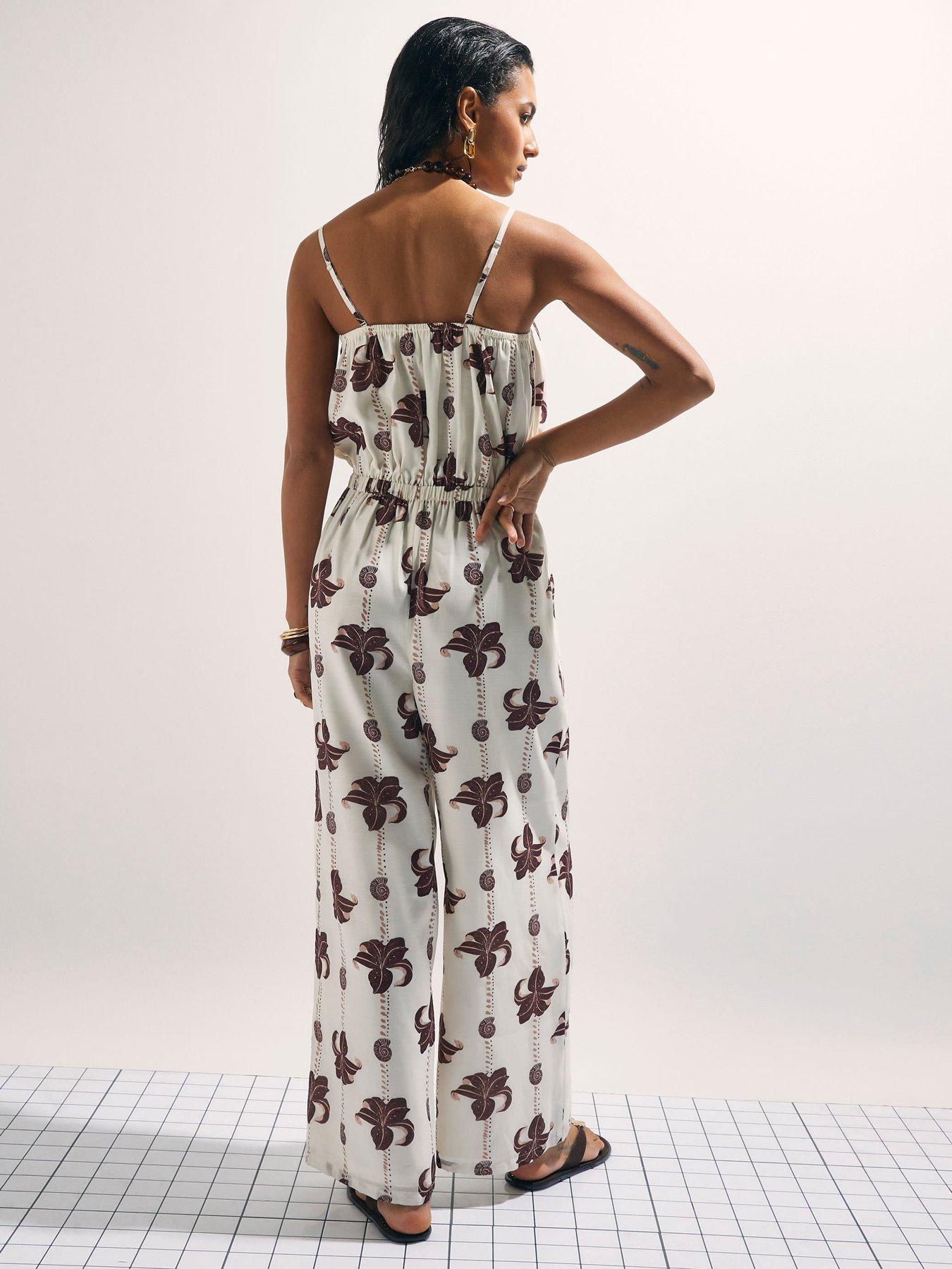 Image 2 of 6 of River Island Palm Print Jumpsuit - Cream