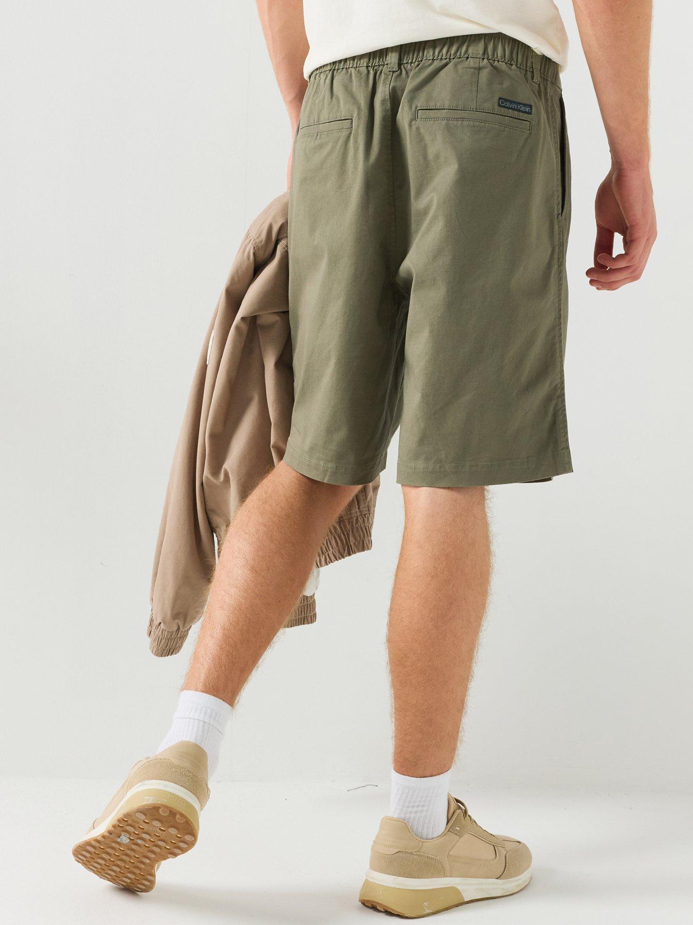 Image 2 of 6 of Calvin Klein Jeans Pleated 9 Chino Shorts - Khaki