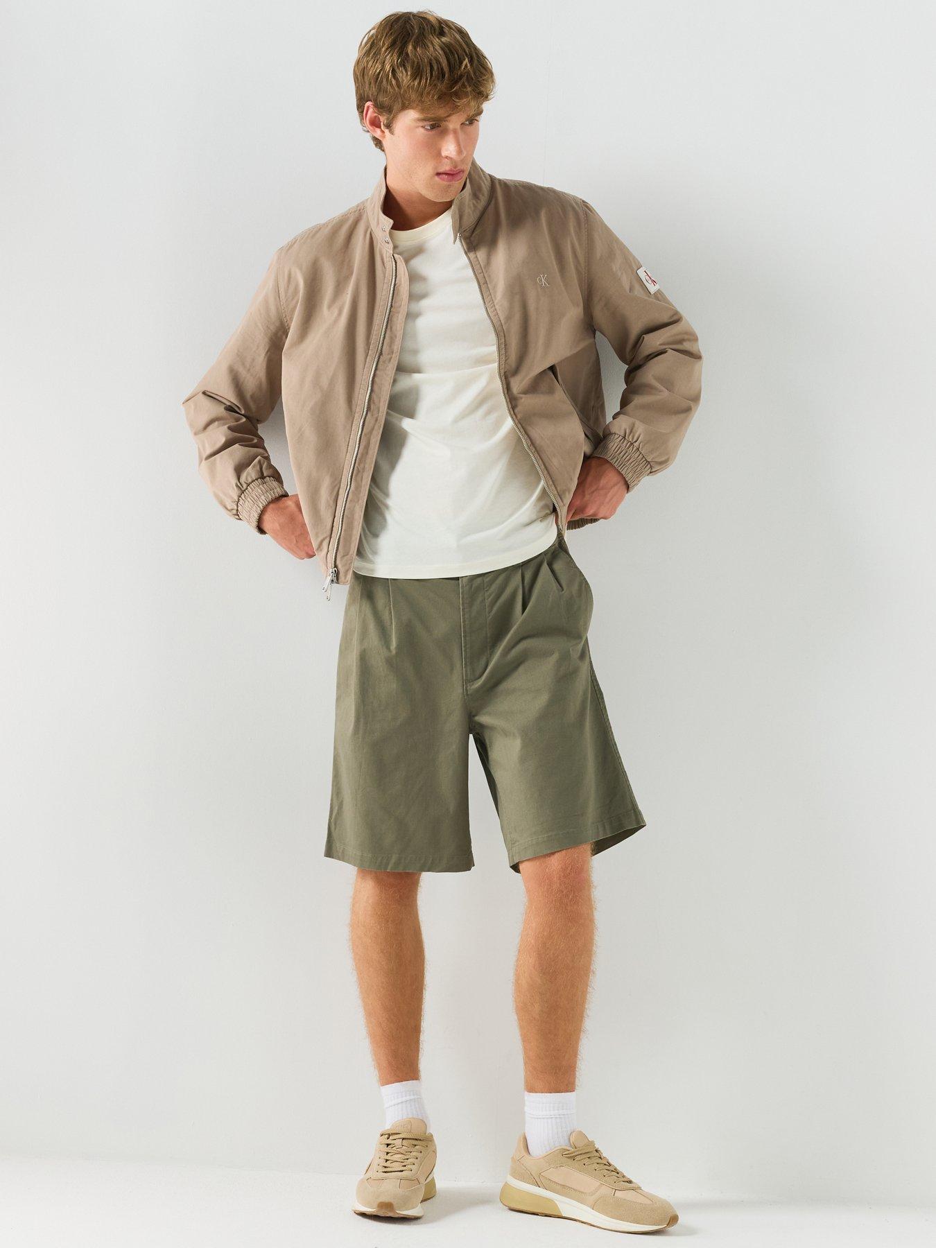 Image 3 of 6 of Calvin Klein Jeans Pleated 9 Chino Shorts - Khaki