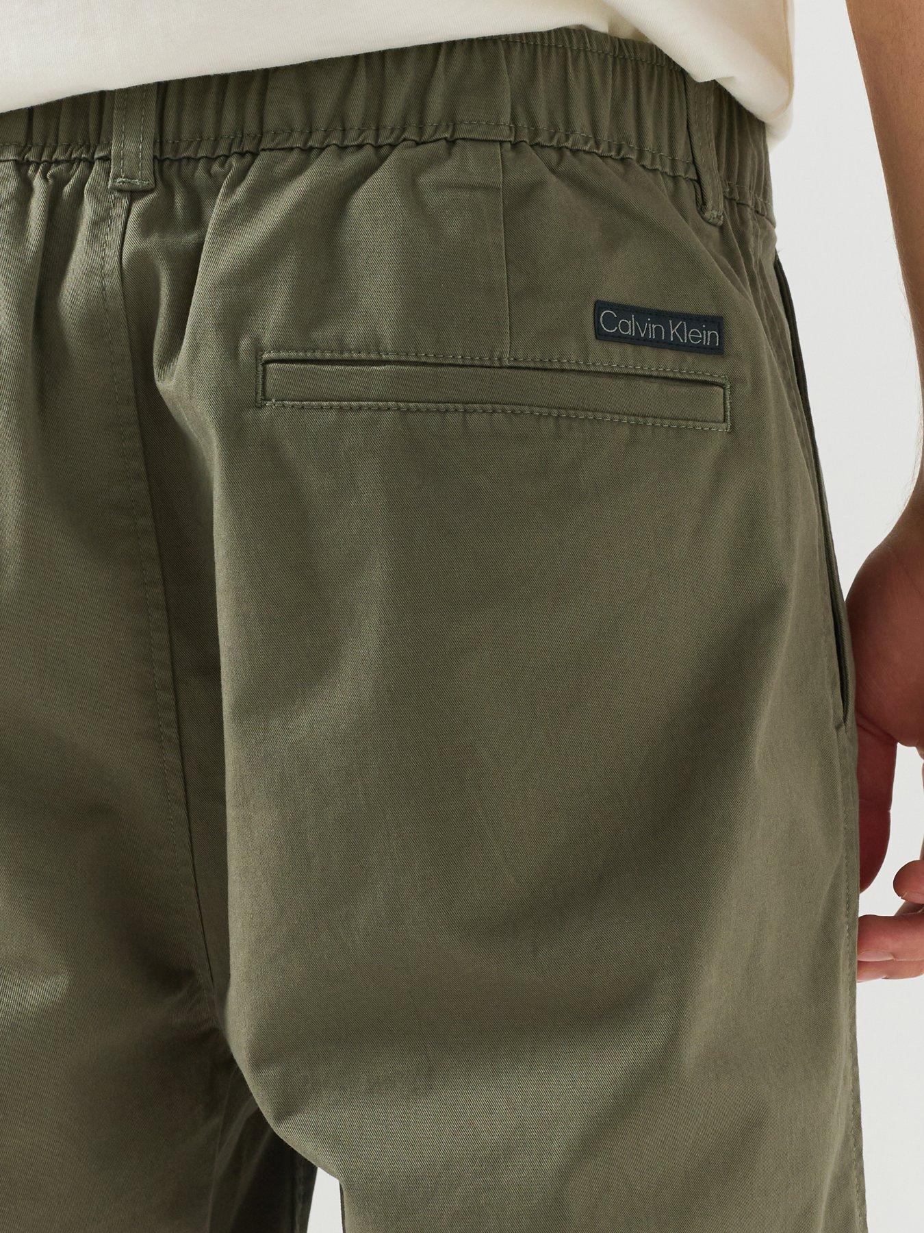 Image 4 of 6 of Calvin Klein Jeans Pleated 9 Chino Shorts - Khaki