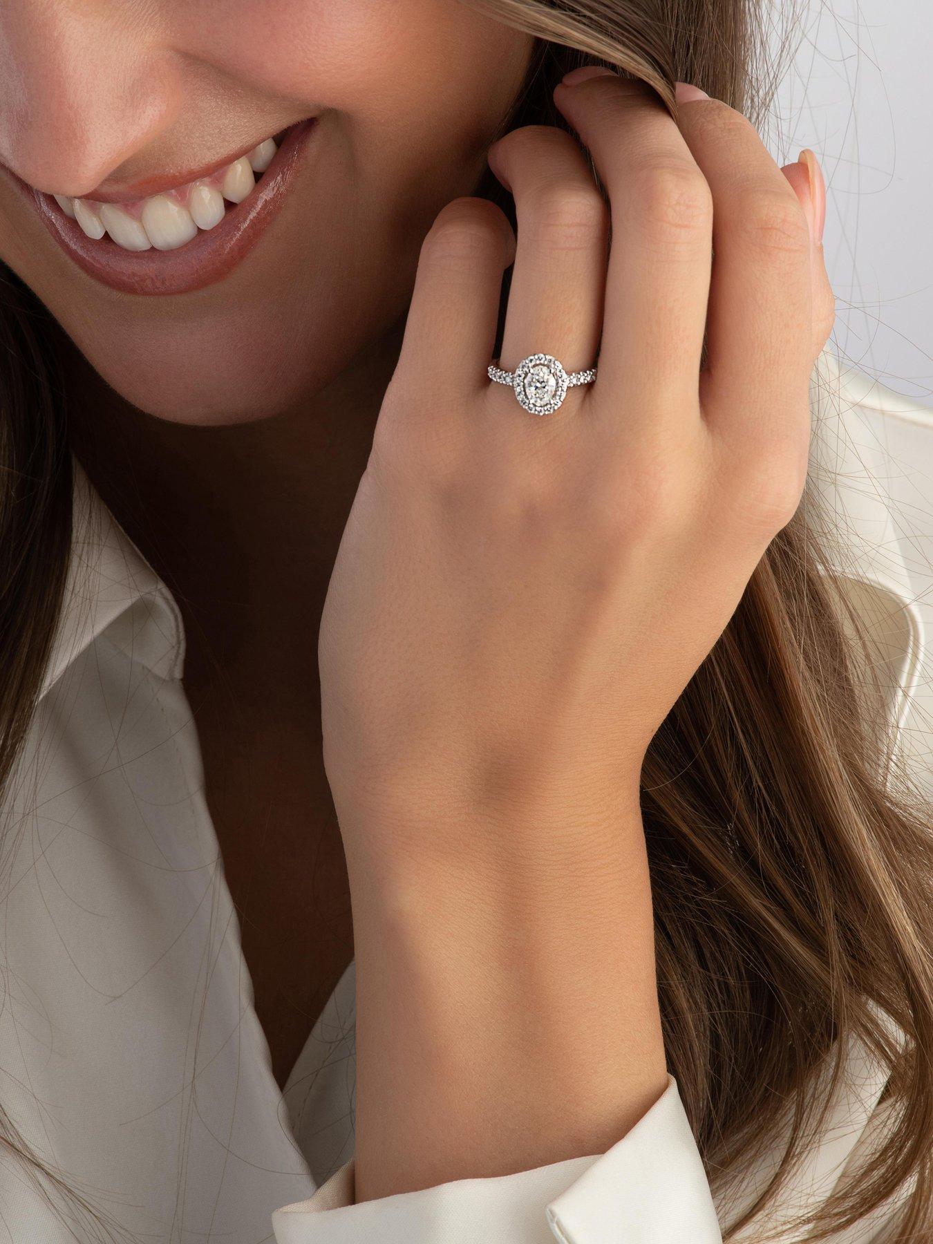 Image 4 of 6 of Beaverbrooks Beaverbrooks Platinum Diamond Oval Cut Halo Ring