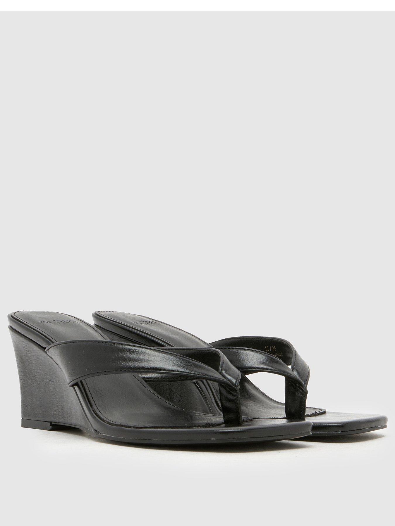schuh-solomon-wedge-sandal-blackstillFront