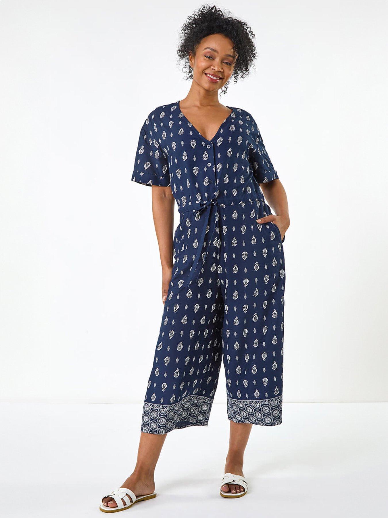 Image 1 of 5 of Roman Petite Print V-neck Cropped Jumpsuit