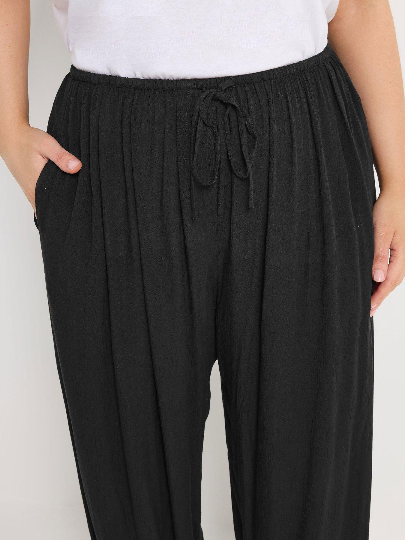 Image 4 of 5 of Yours Curve Woven Cuffed Balloon Trousers - Black