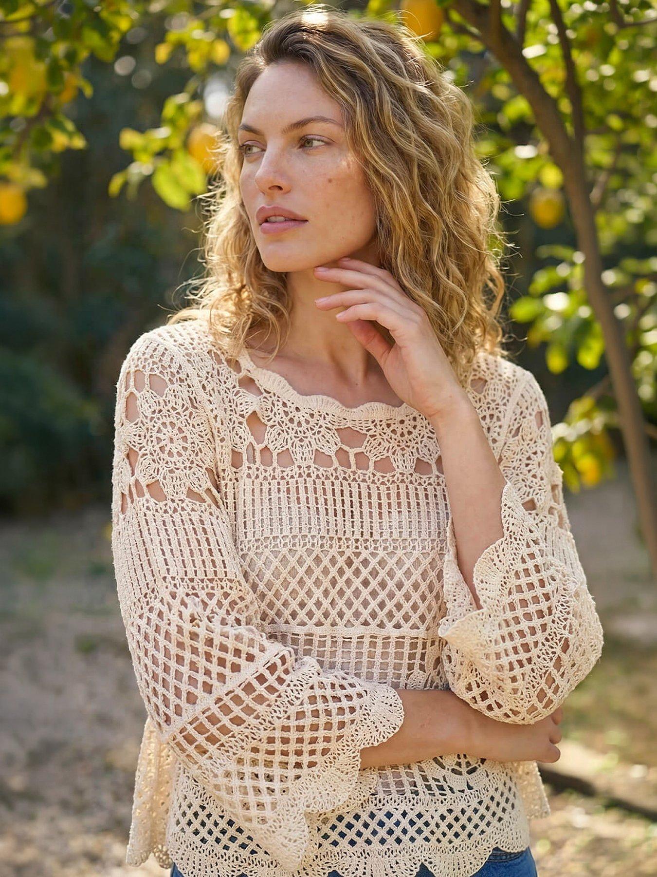 Image 1 of 5 of Roman Crochet Knit Flared Sleeve Top