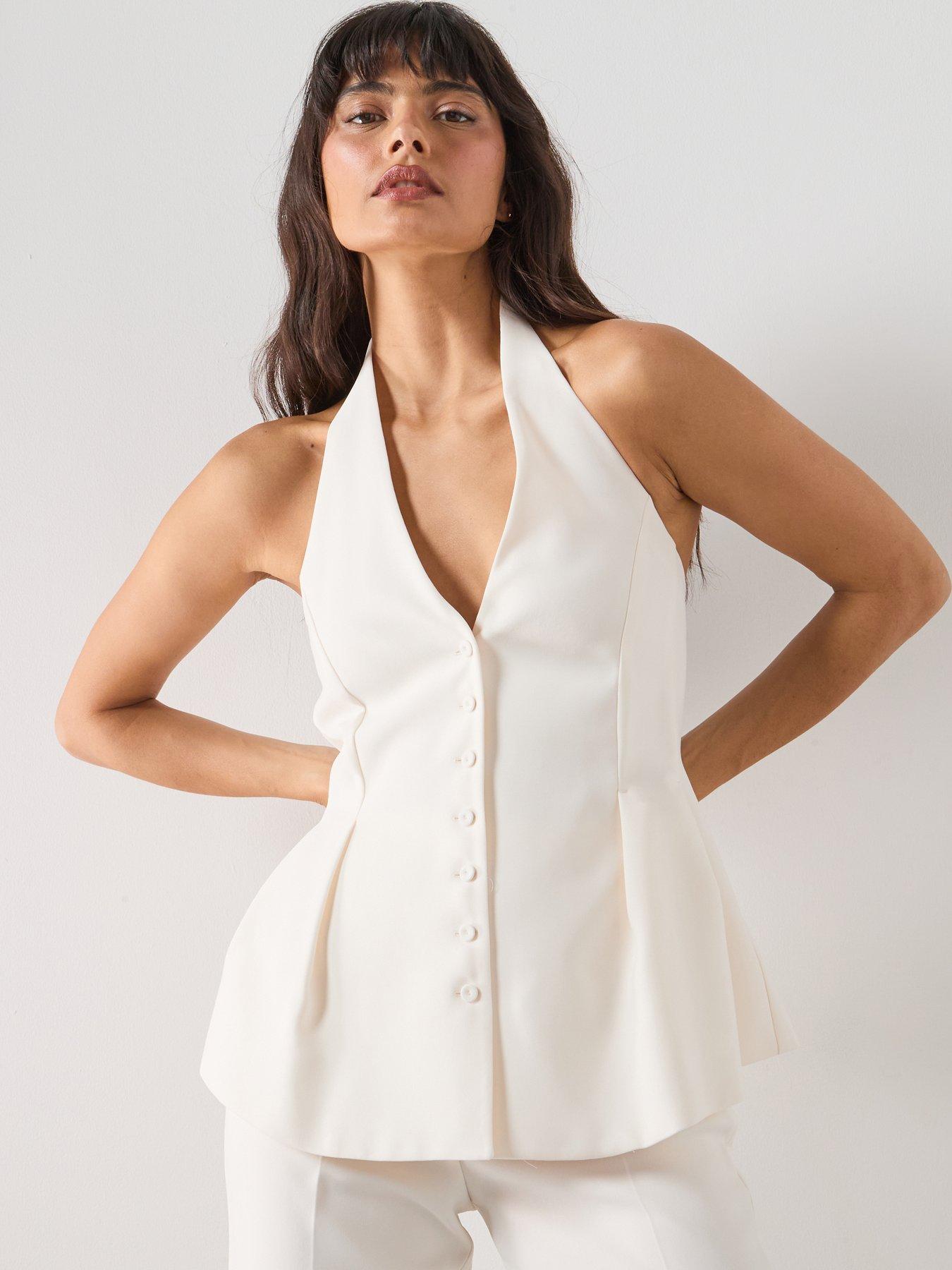 Image 1 of 5 of Mango Peplum Top With Halter Neck - Vanilla