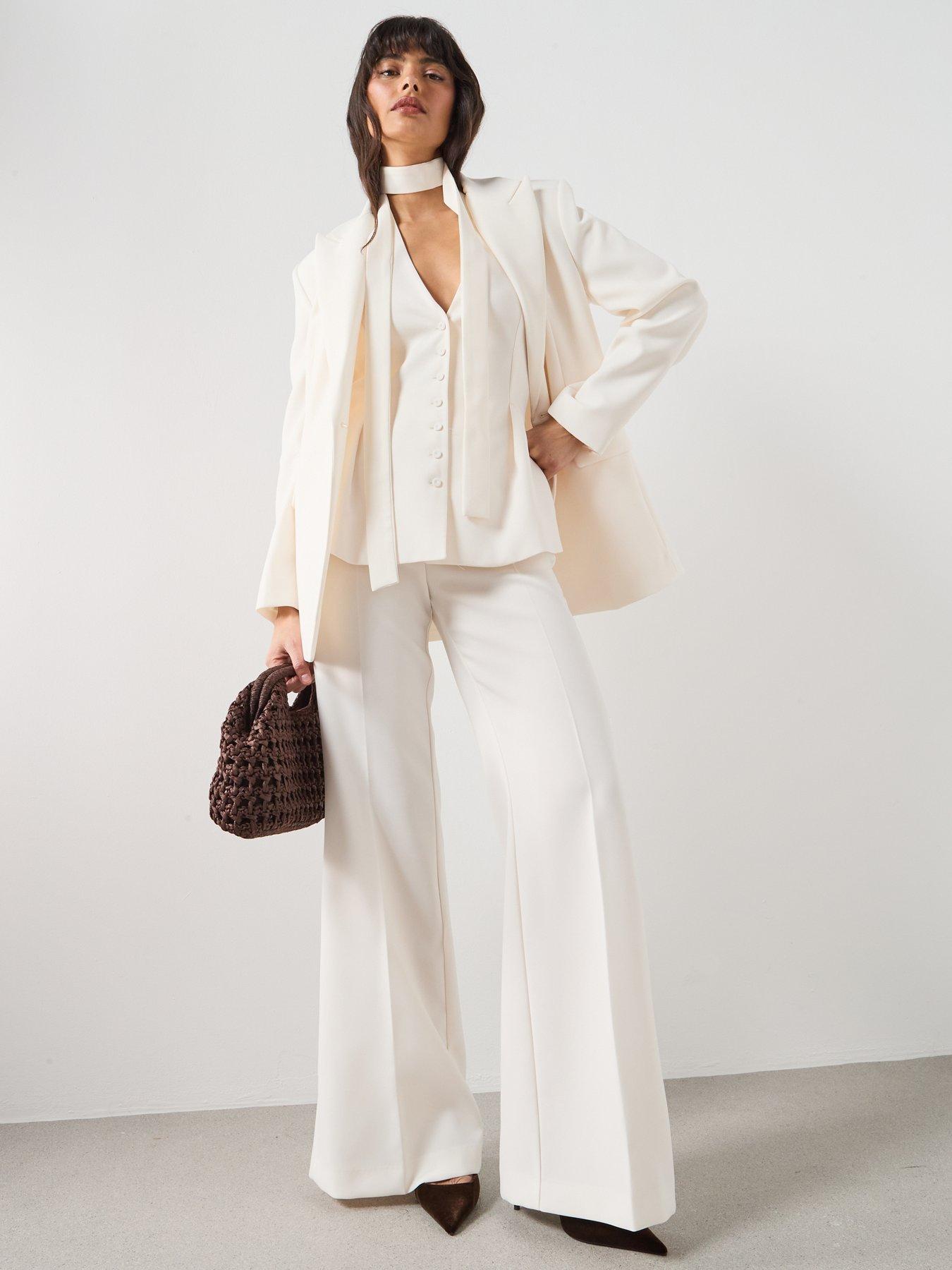Image 3 of 5 of Mango Peplum Top With Halter Neck - Vanilla