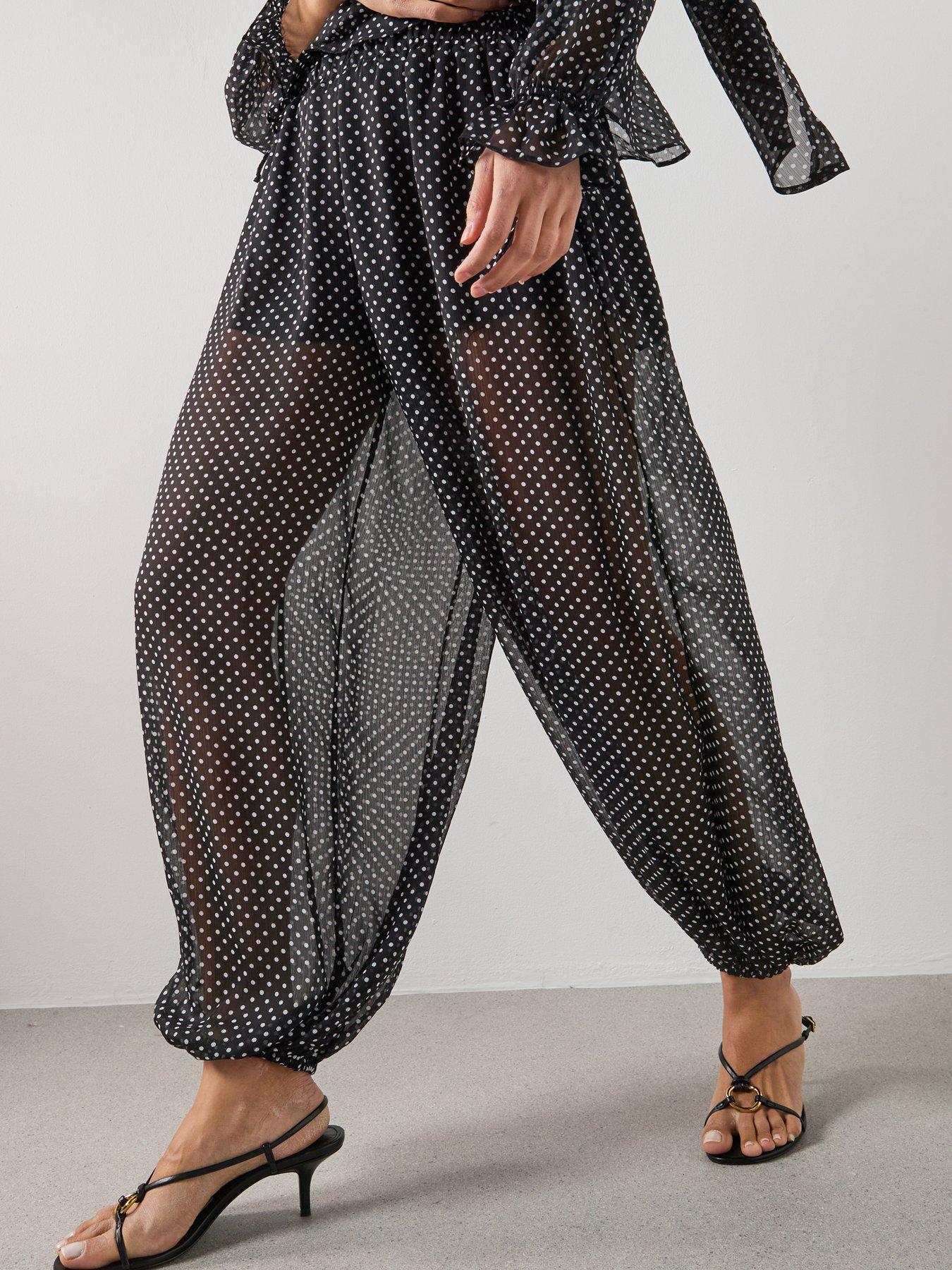 Image 1 of 5 of Mango Polka Dot Baggy Trousers - Black