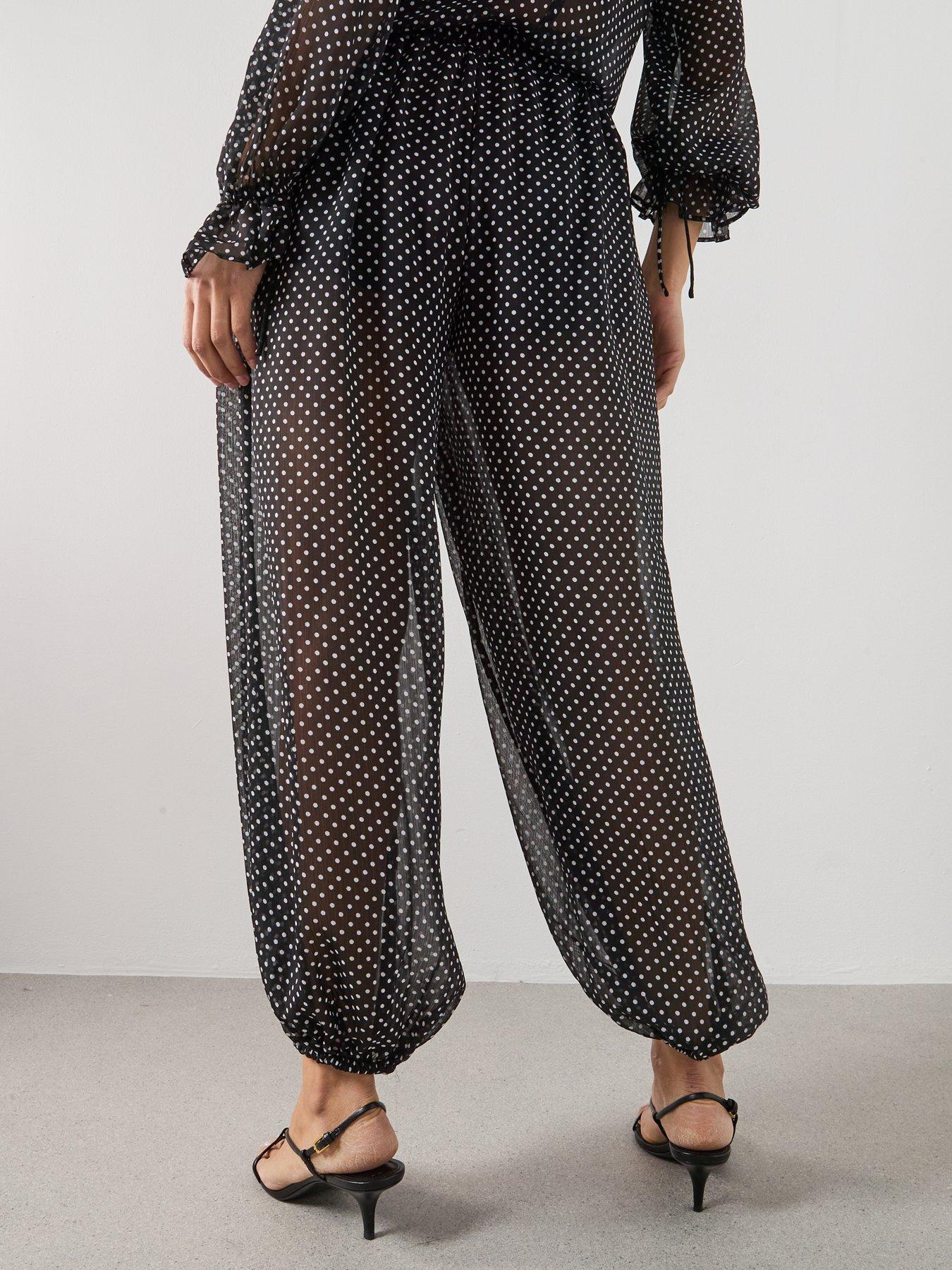 Image 2 of 5 of Mango Polka Dot Baggy Trousers - Black