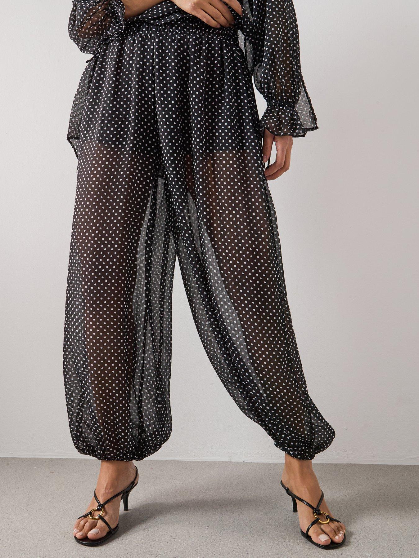 Image 4 of 5 of Mango Polka Dot Baggy Trousers - Black