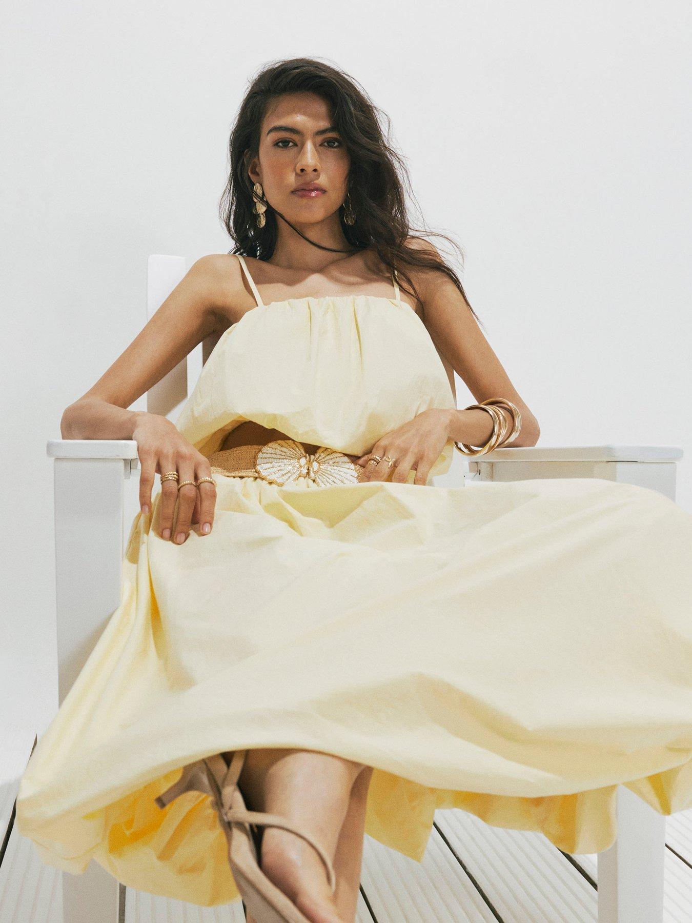 Image 4 of 4 of River Island Poplin Bubble Hem Skirt - Yellow