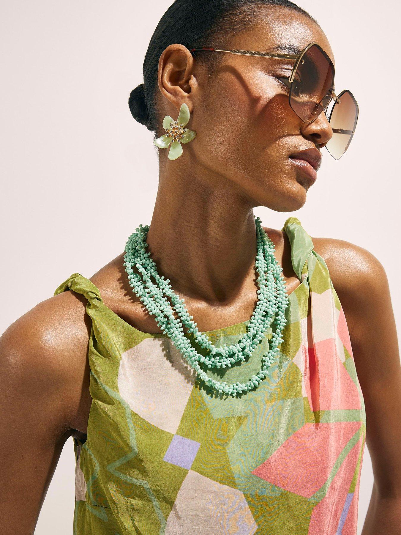 Image 4 of 5 of River Island Del Mar Asym Placed Print Co-ord Top - Green