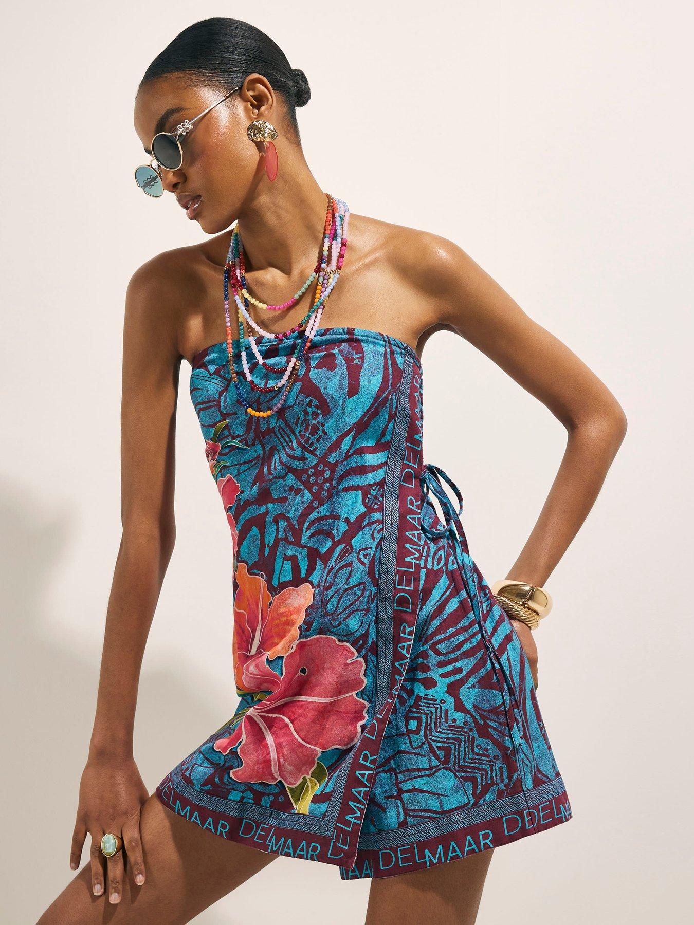 Image 1 of 6 of River Island Del Mar Wrap Mini Playsuit - Blue