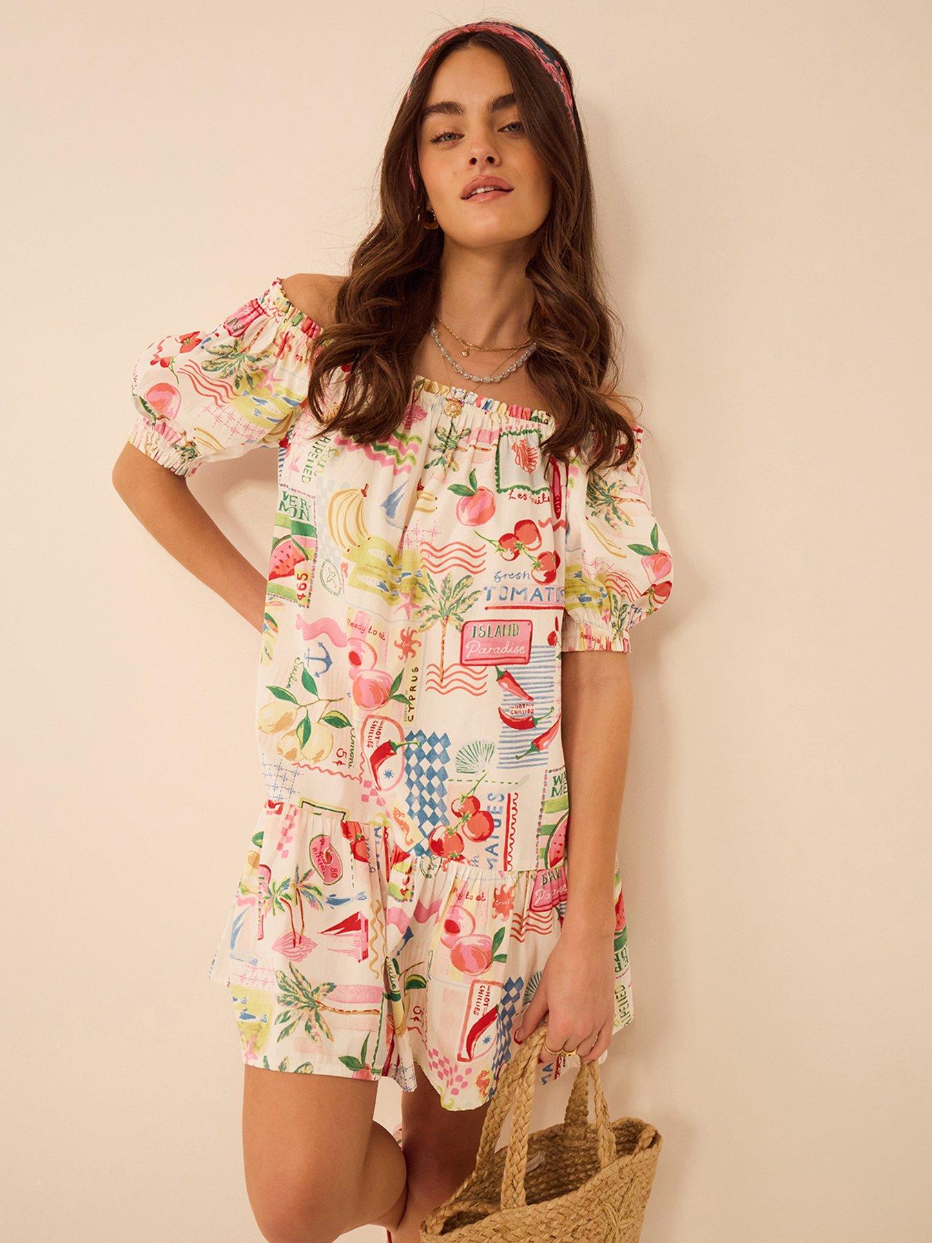 Image 1 of 4 of Accessorize Summer Print Puff Sleeve Mini Dress