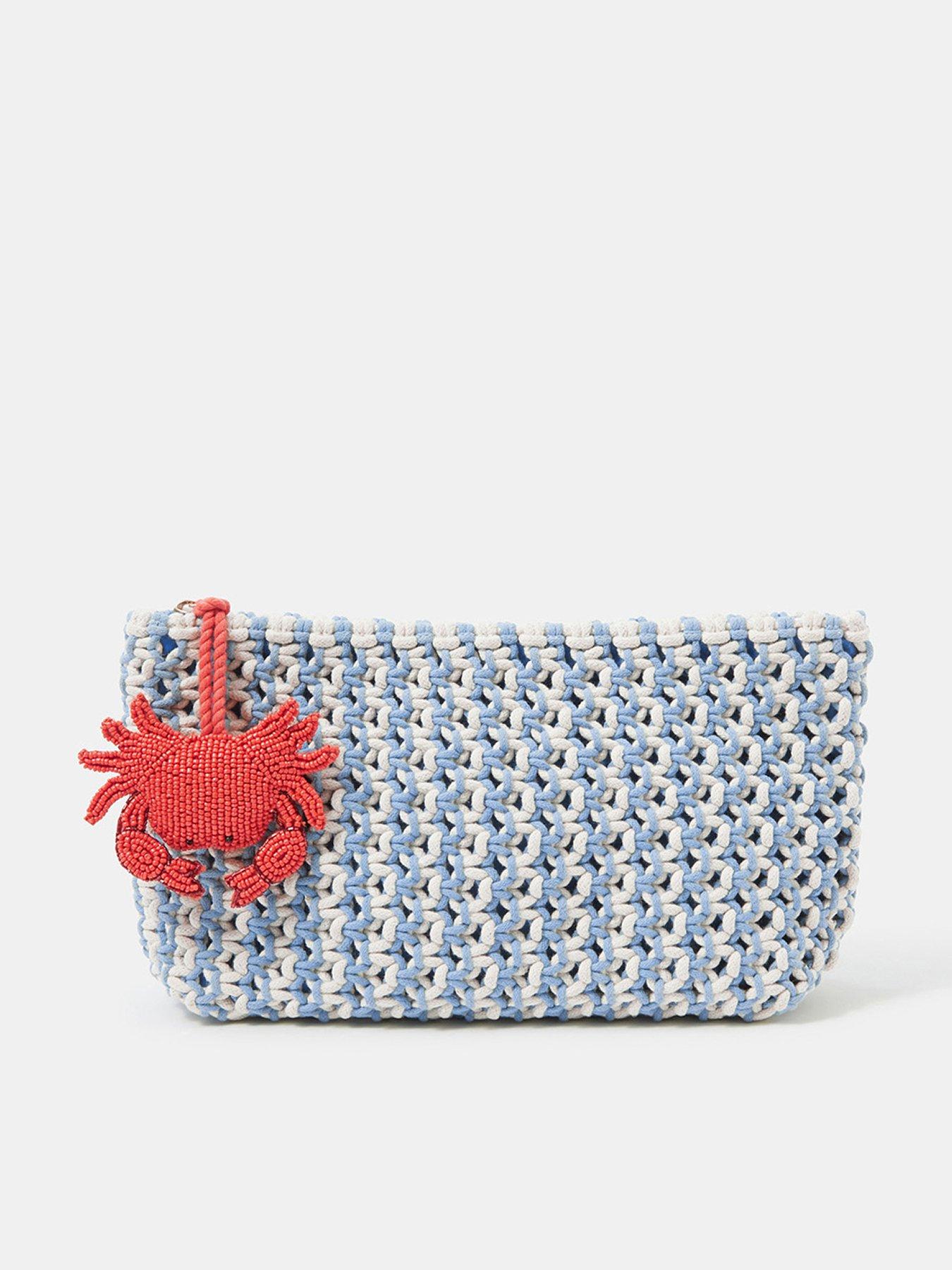 Image 1 of 5 of Accessorize Crab Charm Macrame Clutch Bag