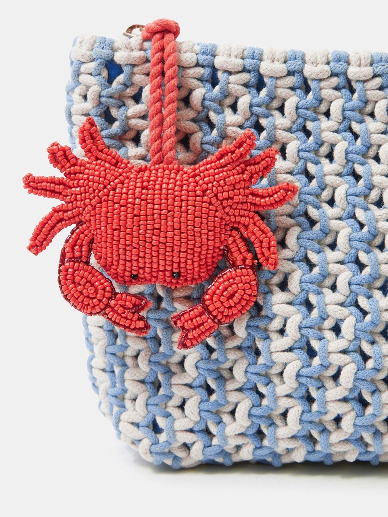 Image 5 of 5 of Accessorize Crab Charm Macrame Clutch Bag