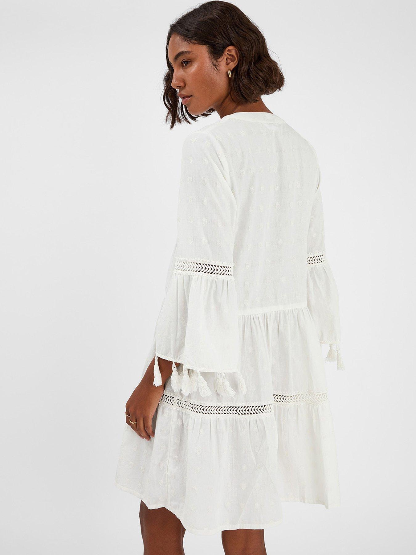 Image 2 of 4 of Accessorize Flute Sleeve Tassel Tiered Mini Dress