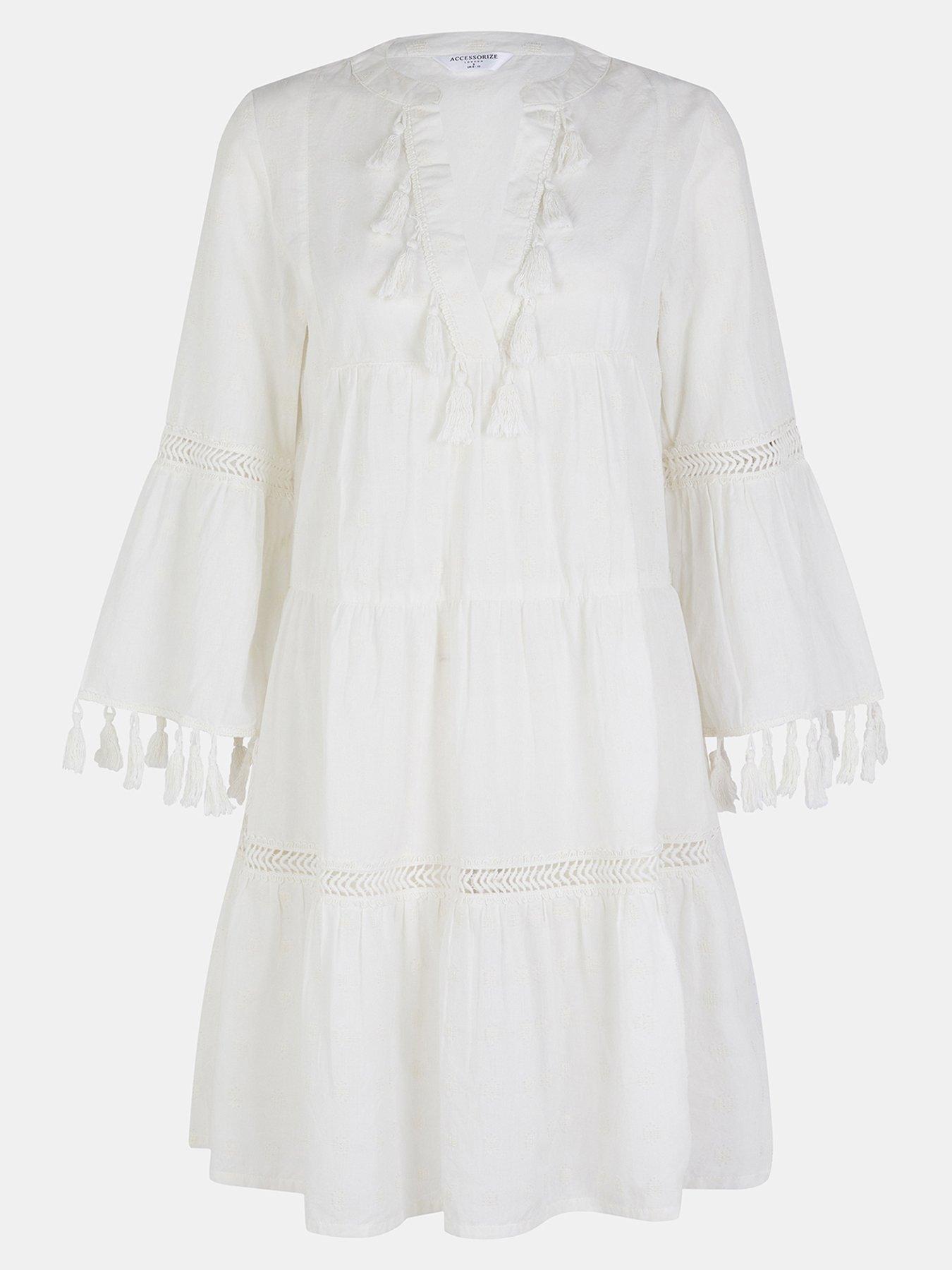 Image 4 of 4 of Accessorize Flute Sleeve Tassel Tiered Mini Dress