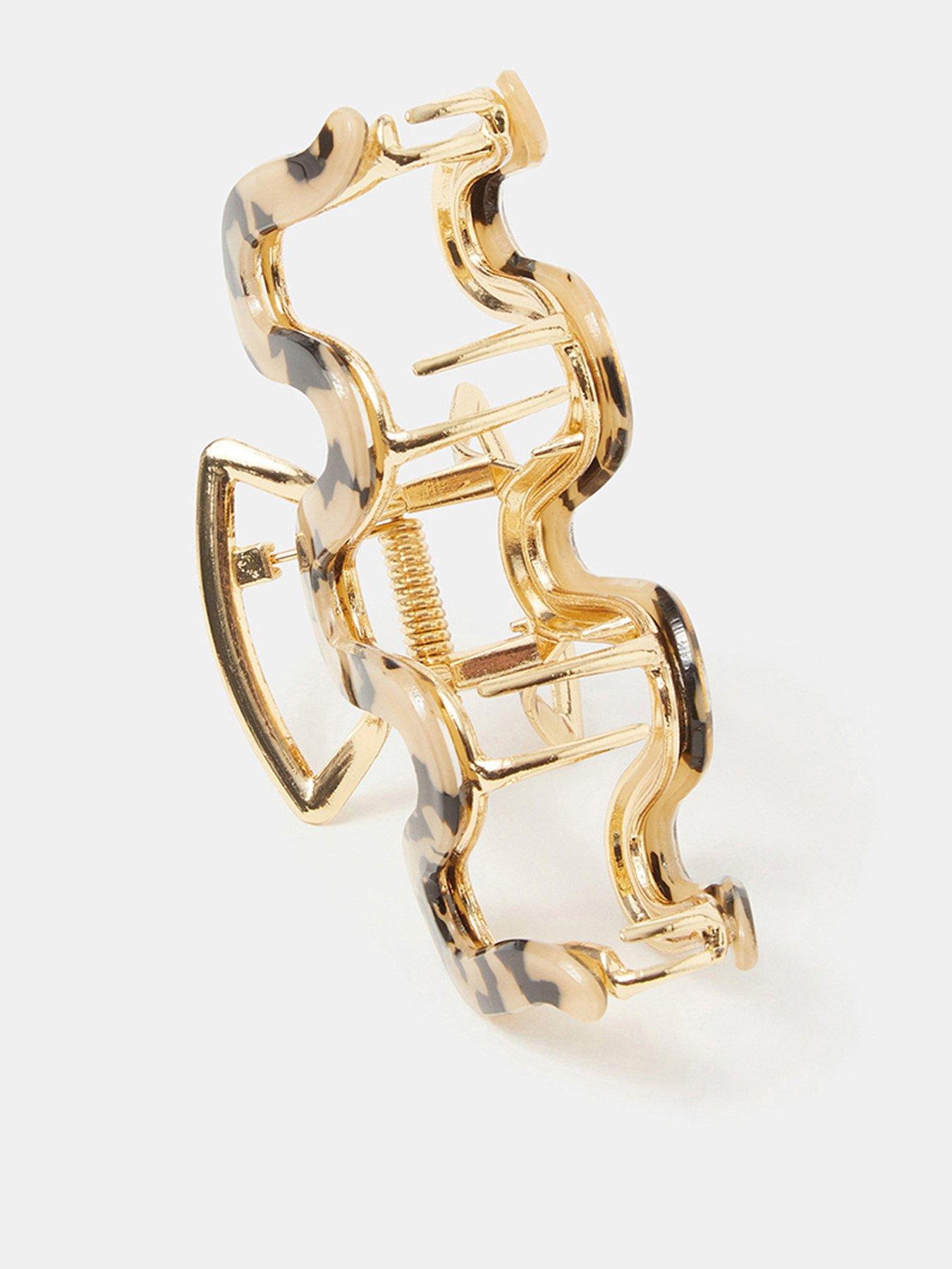 Image 1 of 2 of Accessorize Tort Wiggle Claw Clip