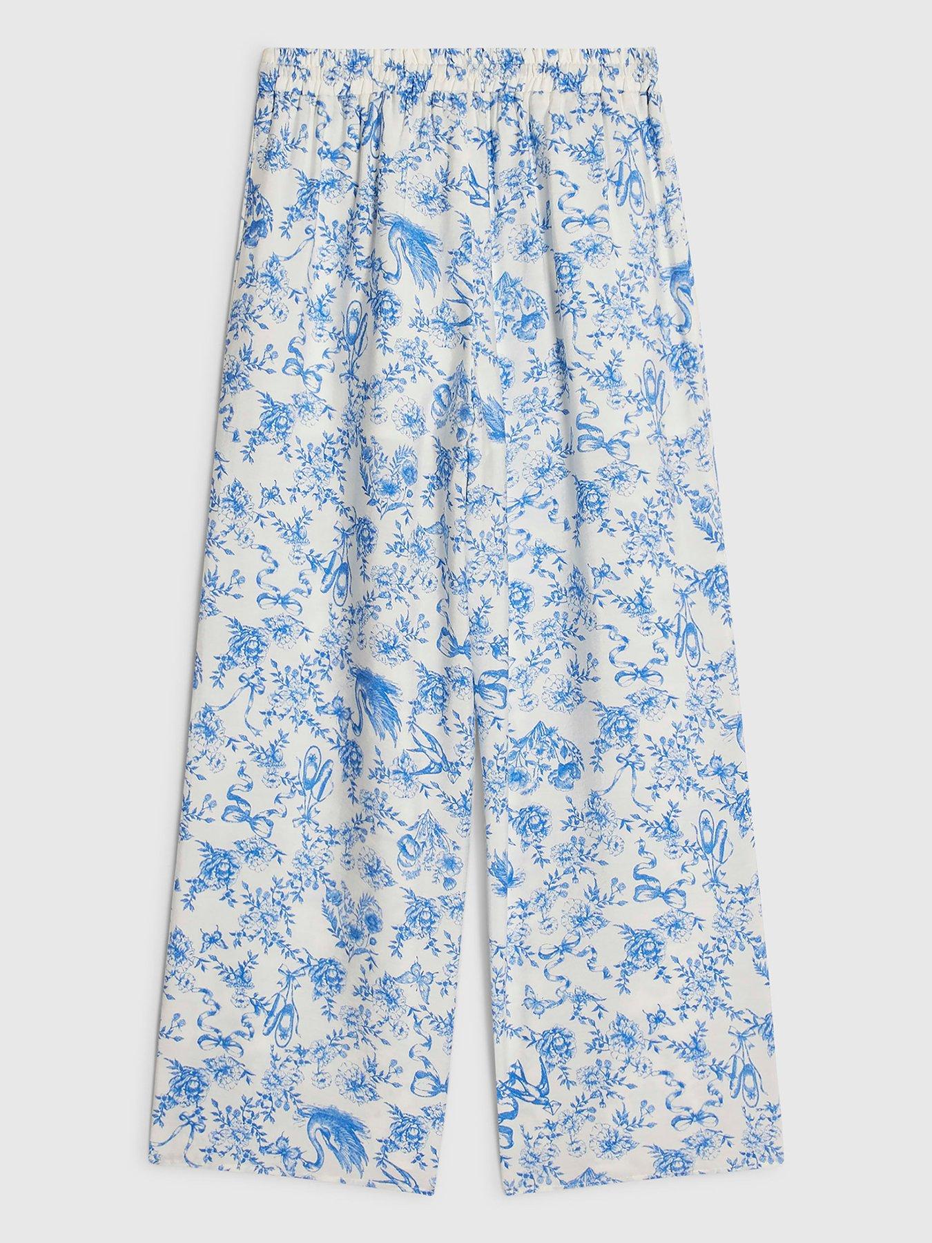 Image 2 of 4 of River Island Older Girls Floral Santorini Toile Trousers - Blue