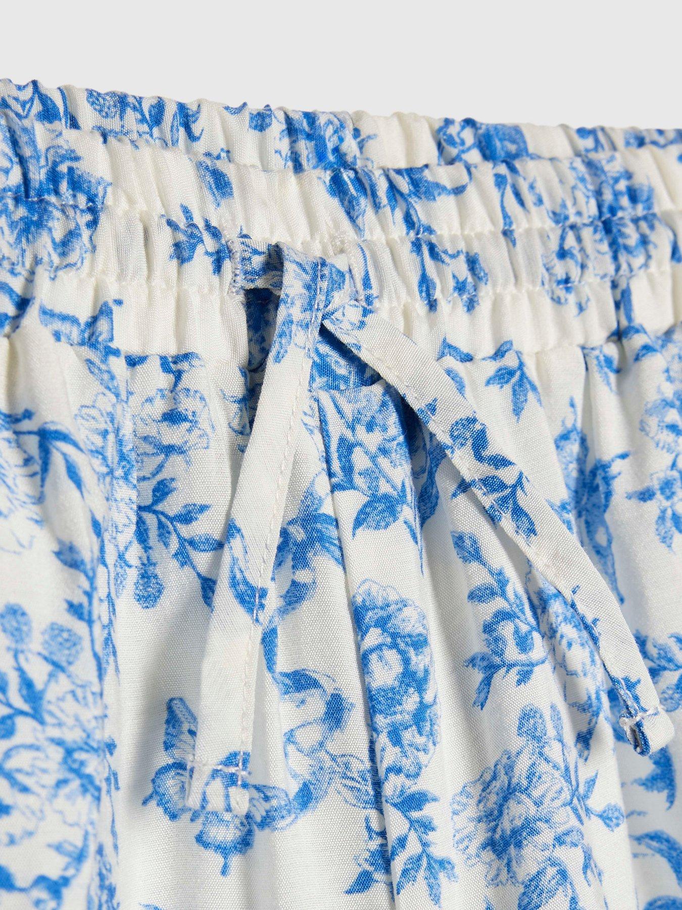 Image 3 of 4 of River Island Older Girls Floral Santorini Toile Trousers - Blue