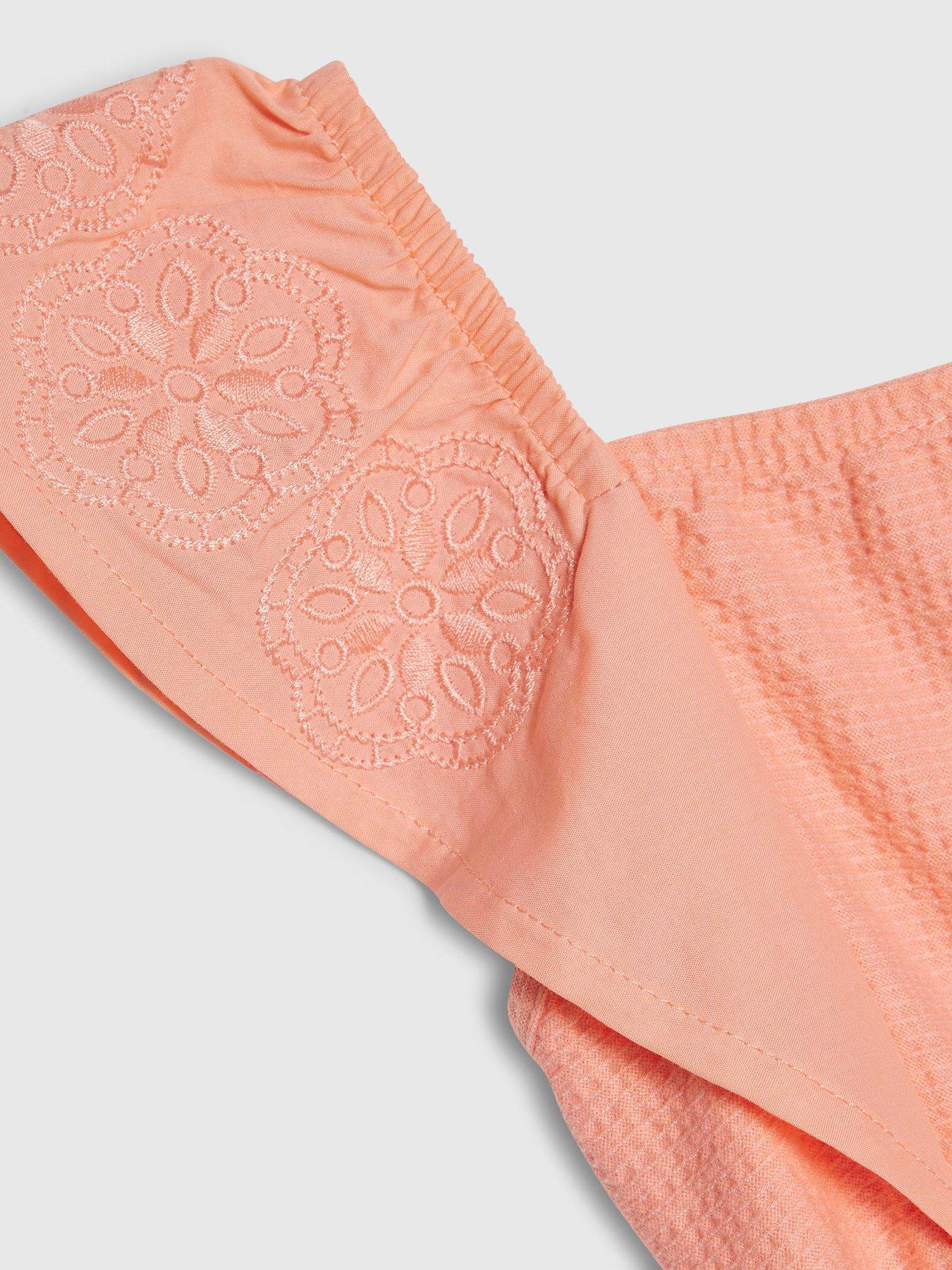 Image 3 of 3 of River Island Mini Girls Shirred Jersey Playsuit - Orange