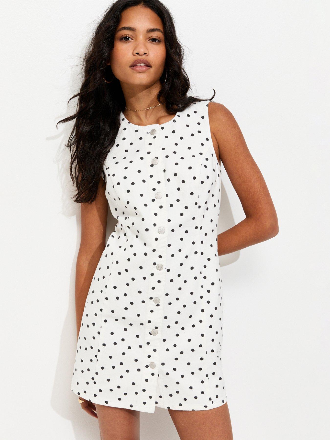 Image 1 of 5 of New Look Polka Dot Denim Mini Dress - White