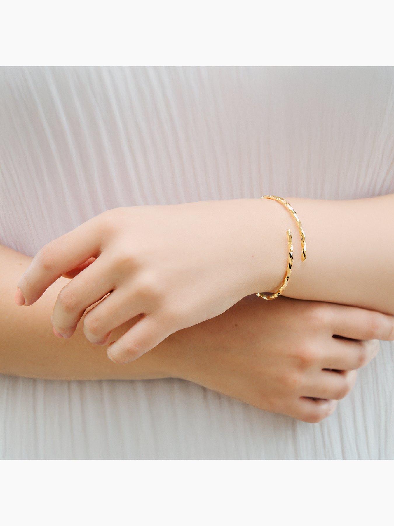 the-love-collection-9ct-yellow-gold-twisted-tube-crossover-hinged-bangledetail
