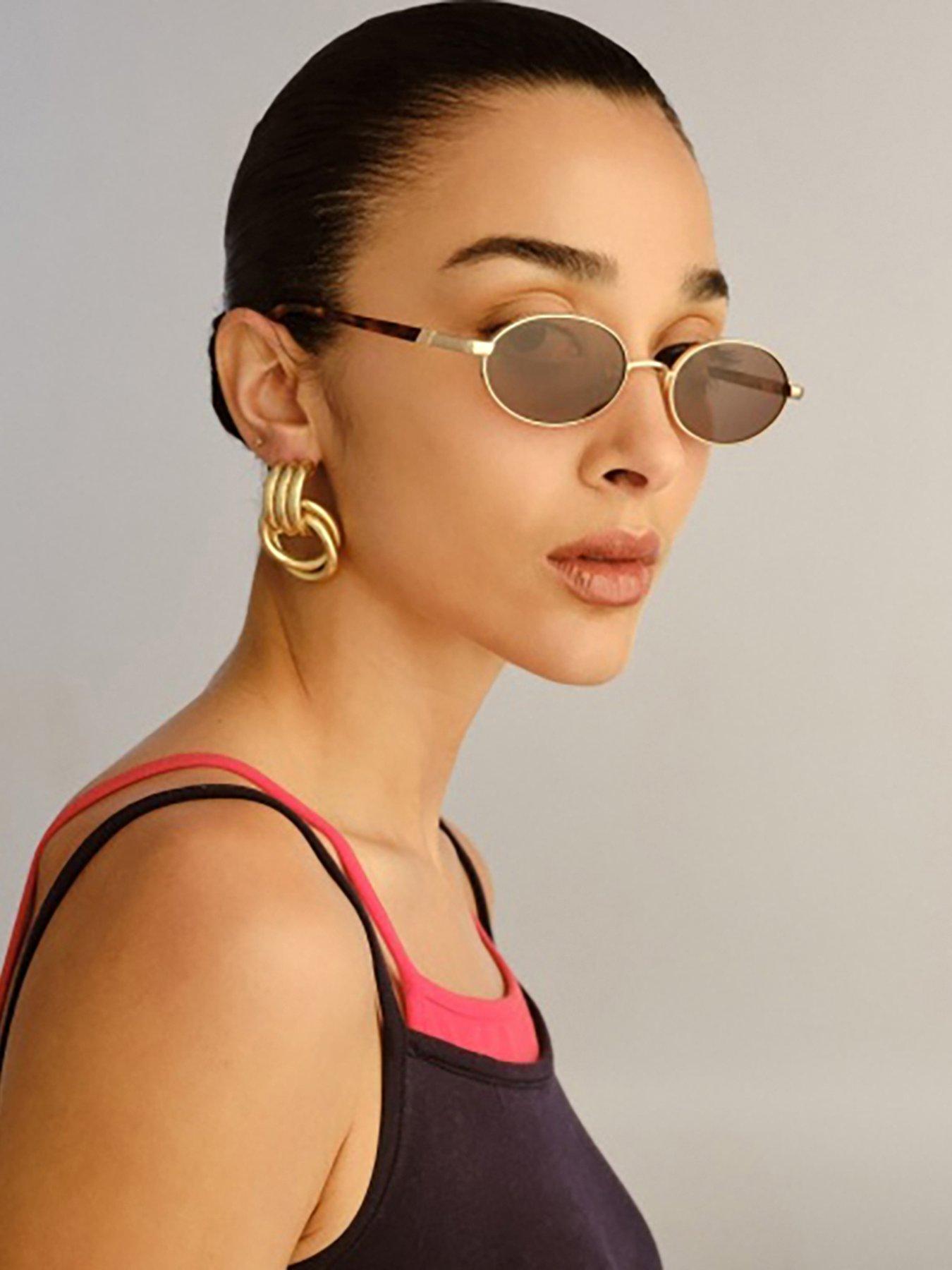 LE SPECS Oval Icicle Sunglasses - Gold
