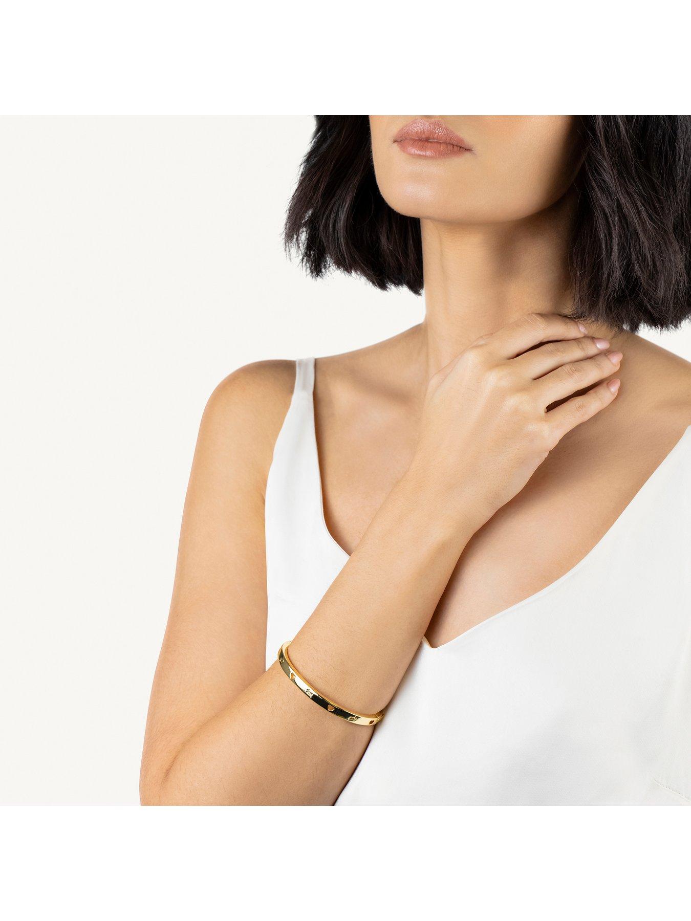 radley-pale-gold-cut-out-heart-amp-dog-banglestillFront