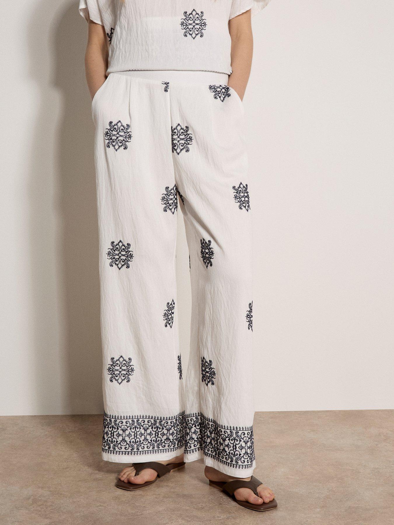 apricot-paisley-border-embroidered-trousersfront
