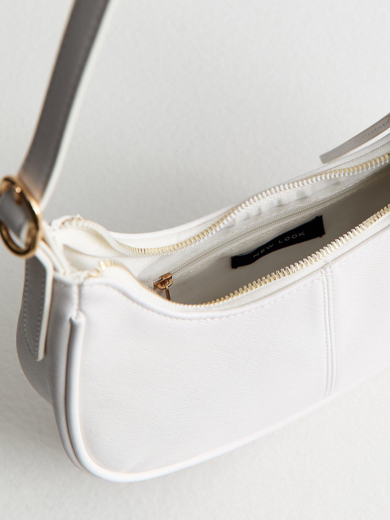 Image 5 of 5 of New Look Grained Faux Leather Oval Buckle Shoulder Bag - White