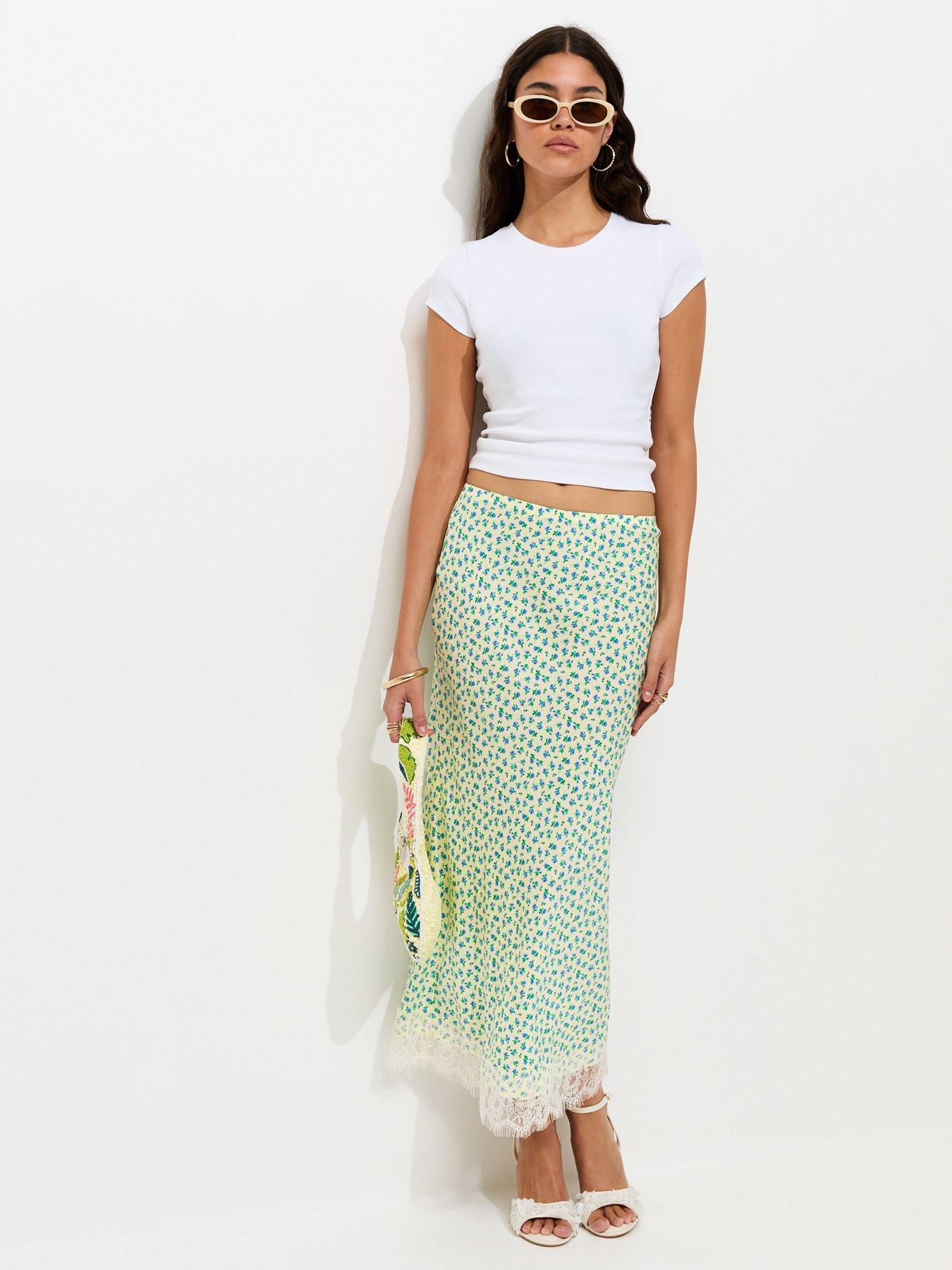 Image 1 of 5 of New Look Ditsy Floral Bias Cut Midi Skirt - Yellow