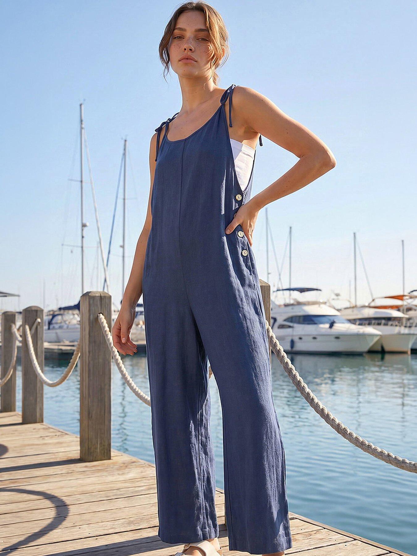 Image 1 of 5 of Roman Petite Strappy Tie Button Jumpsuit