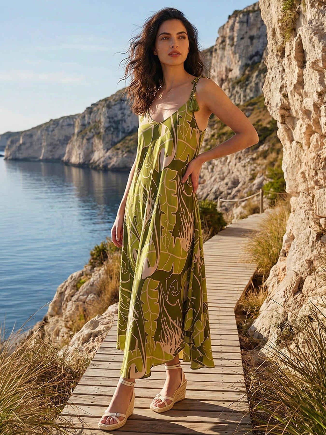 Image 1 of 4 of Roman Dusk Leaf Print Tassel Maxi Dress