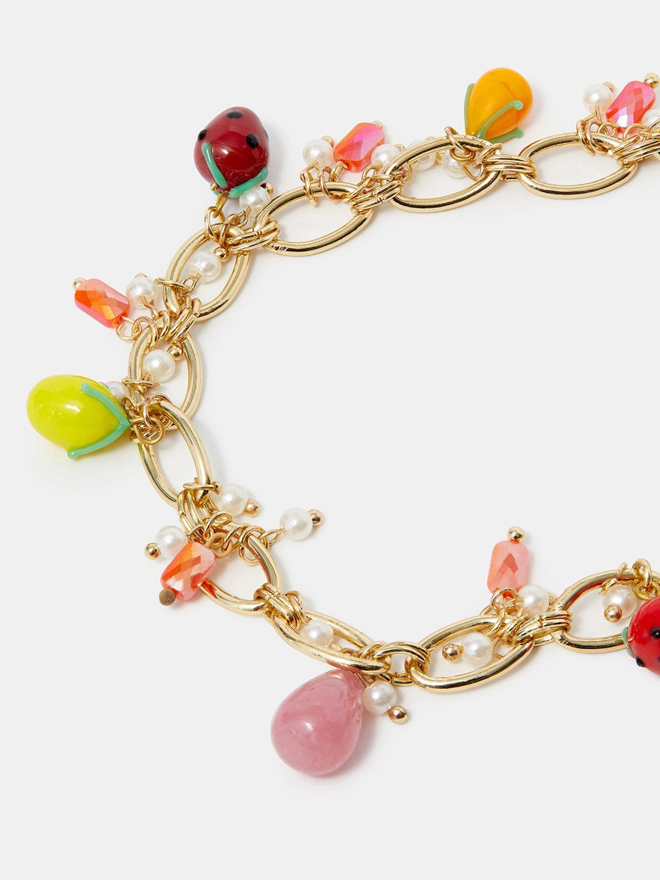 Image 4 of 4 of Accessorize Fruit Charm Wrist Phone Strap - Multi