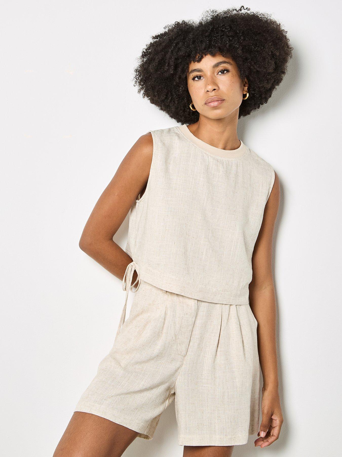 Image 1 of 4 of Apricot Apricot Ribbed Neck Side Tie Shell Top