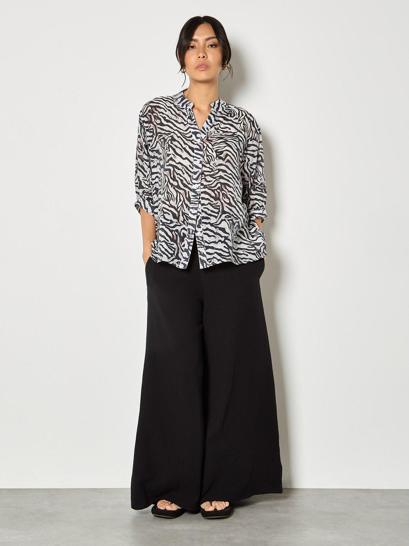 Image 3 of 4 of Apricot Zebra Oversized Semi-sheer Blouse
