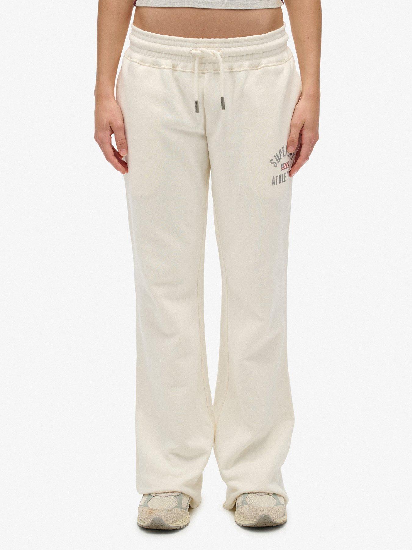 Image 1 of 7 of Superdry Athletic Print Flare Joggers - Cream